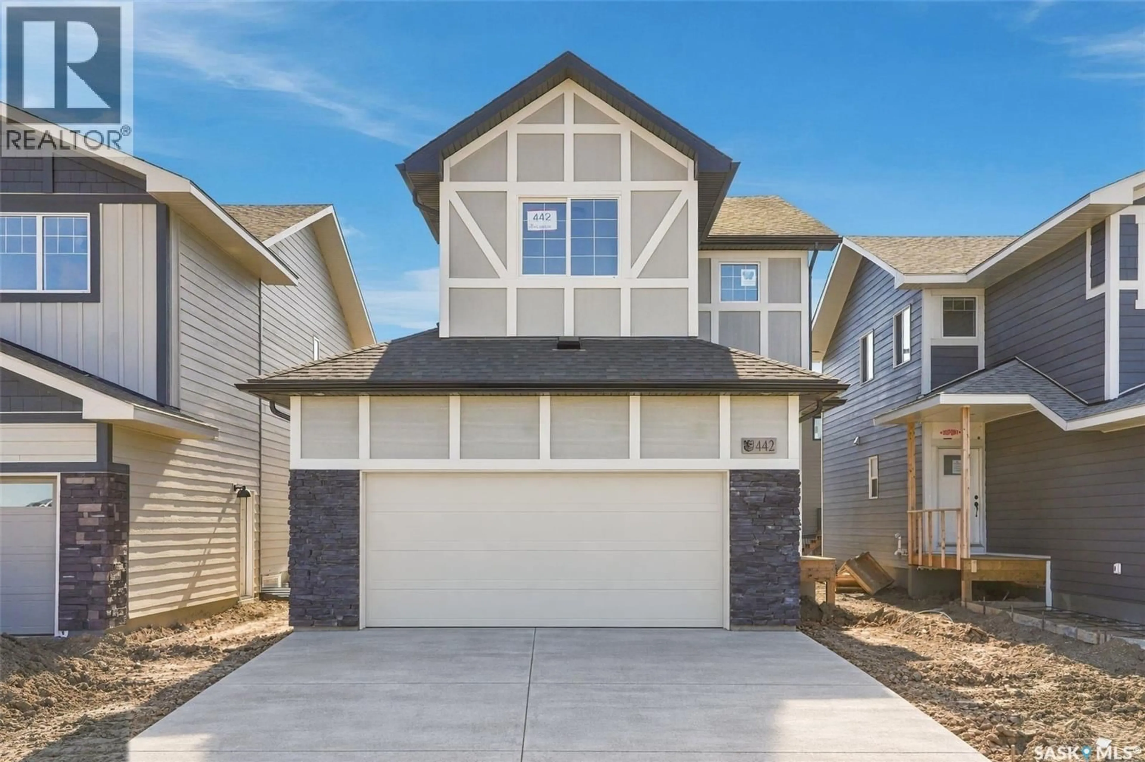 Home with vinyl exterior material, street for 442 LESKIW BEND, Saskatoon Saskatchewan S7V2A6