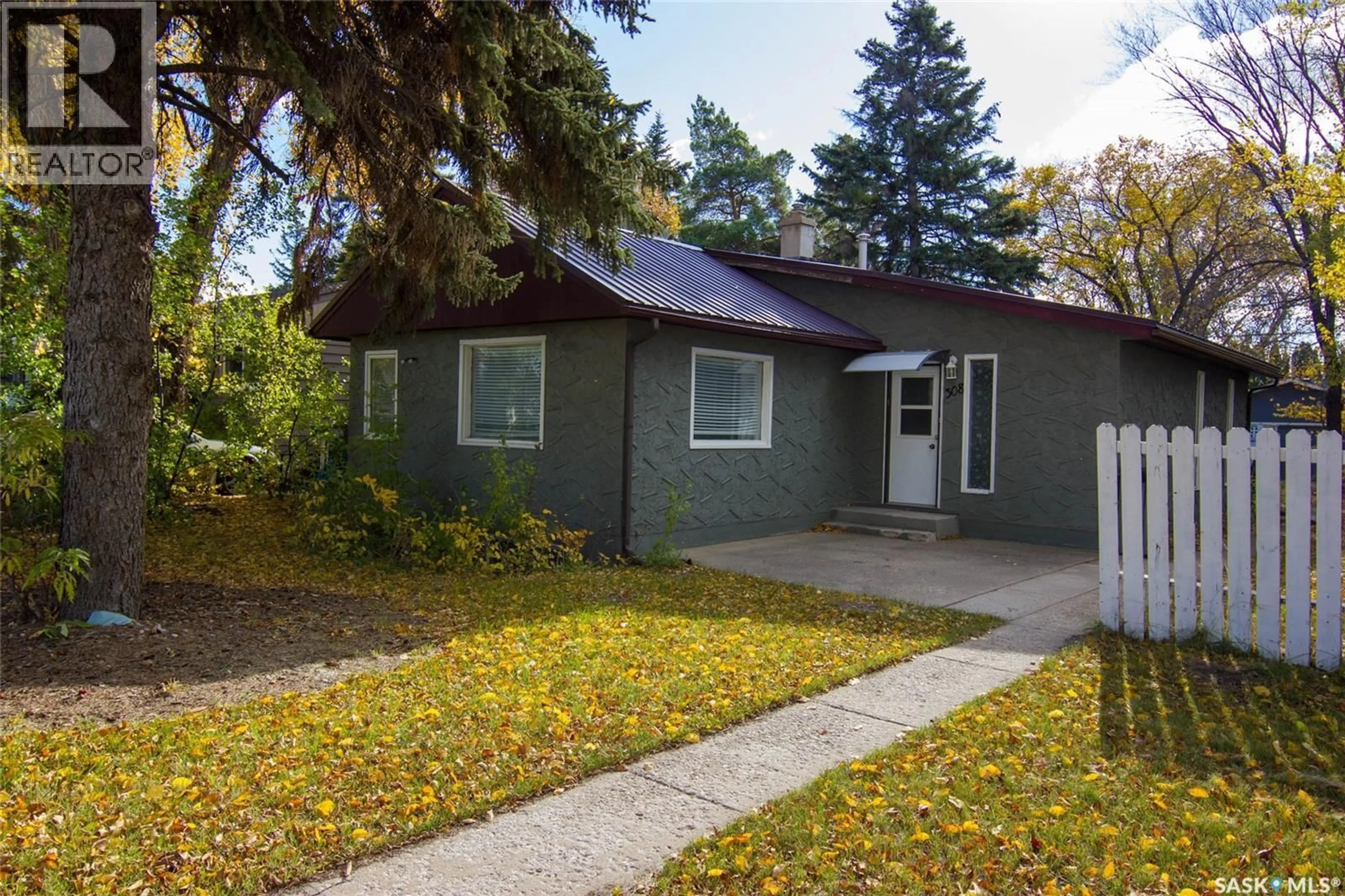 Home with vinyl exterior material, street for 308 HILLIARD STREET, Saskatoon Saskatchewan S7J0E6