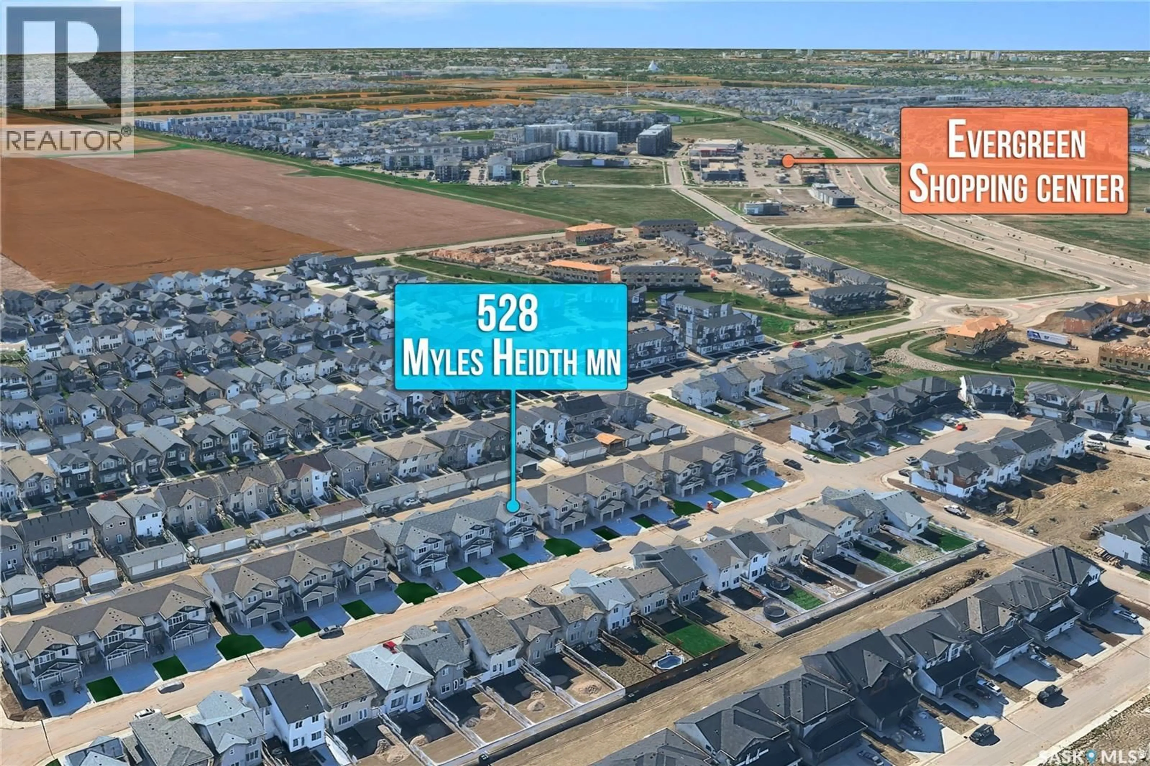 A pic from outside/outdoor area/front of a property/back of a property/a pic from drone, street for 528 MYLES HEIDT MANOR, Saskatoon Saskatchewan S7W1H9