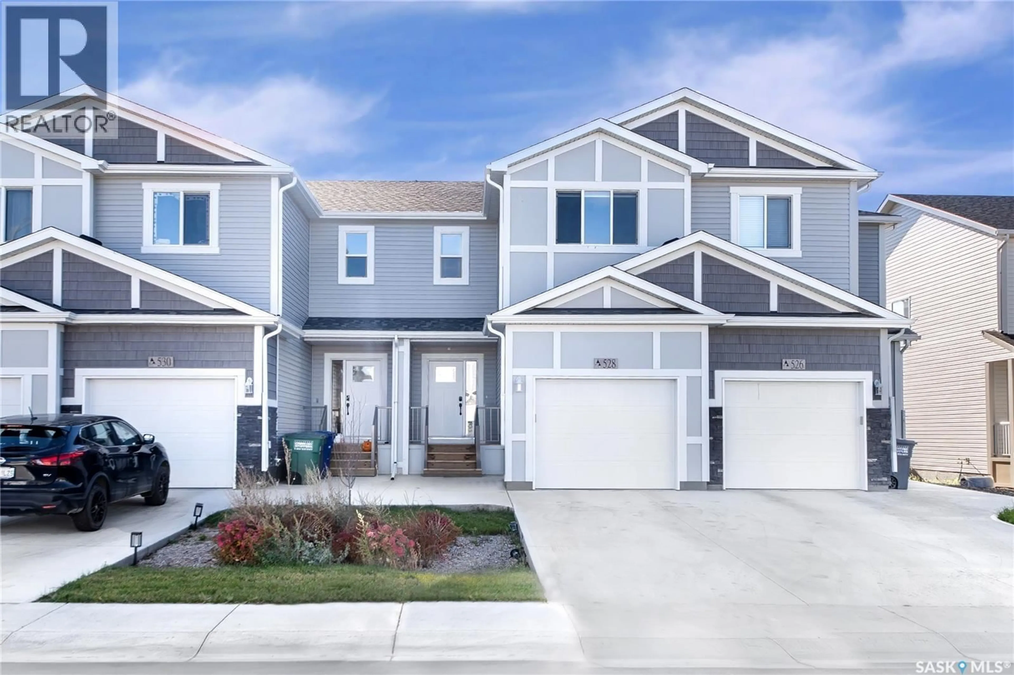 Home with vinyl exterior material, street for 528 MYLES HEIDT MANOR, Saskatoon Saskatchewan S7W1H9