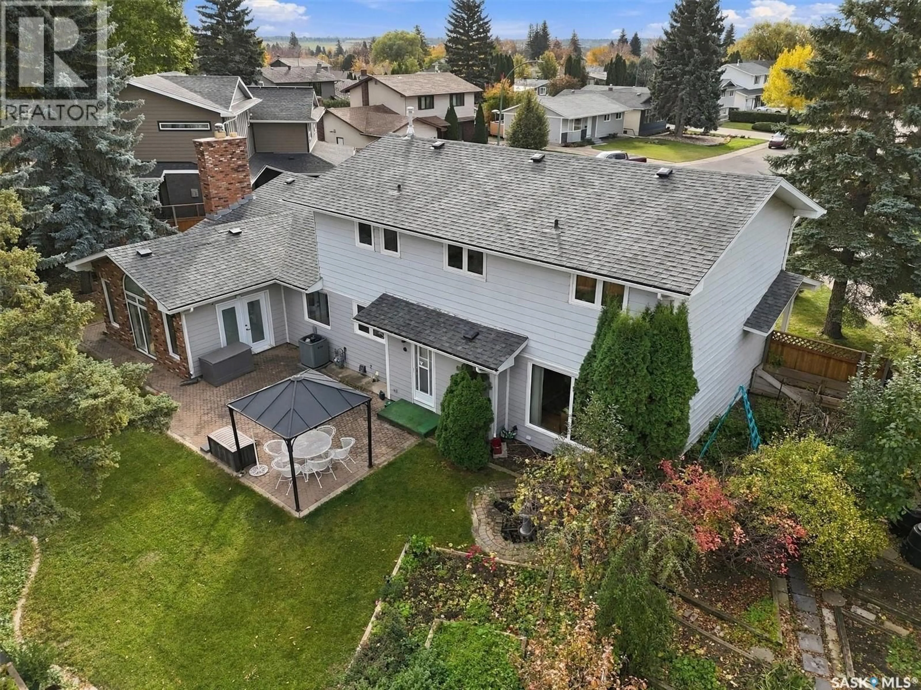 A pic from outside/outdoor area/front of a property/back of a property/a pic from drone, unknown for 225 CLEARWATER COURT, Saskatoon Saskatchewan S7K3Y9