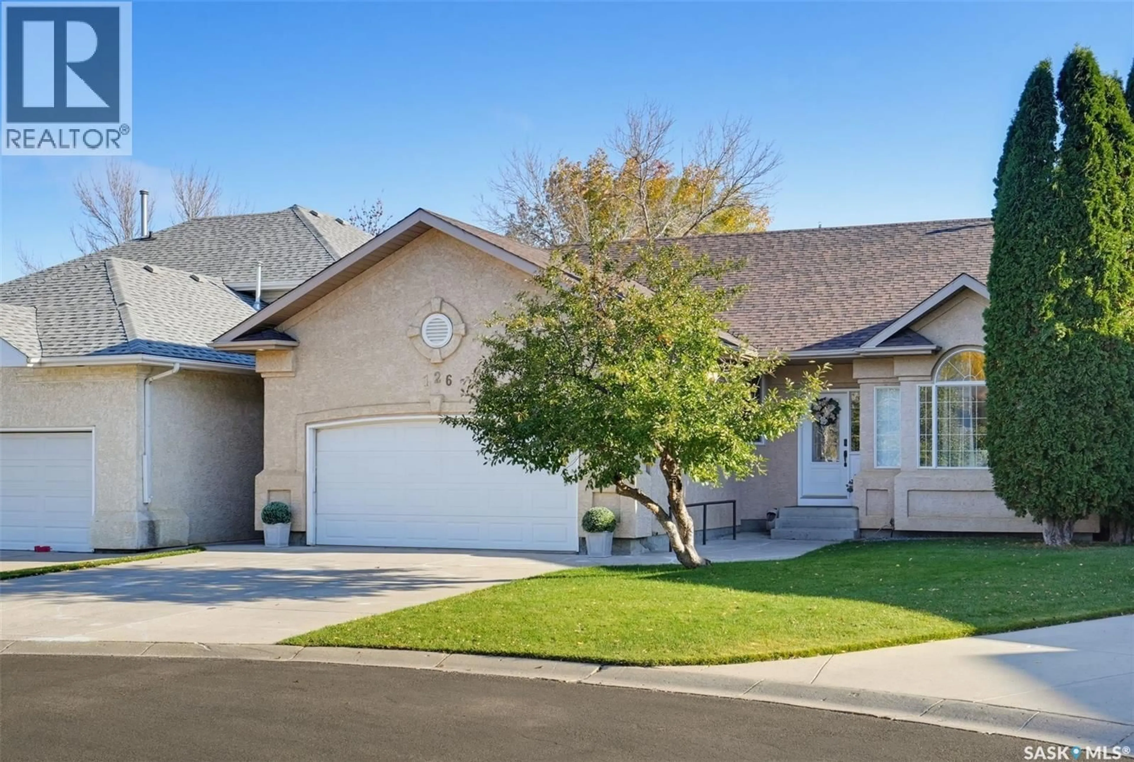 Home with vinyl exterior material, street for 126 WOODS COURT, Saskatoon Saskatchewan S7N4M2
