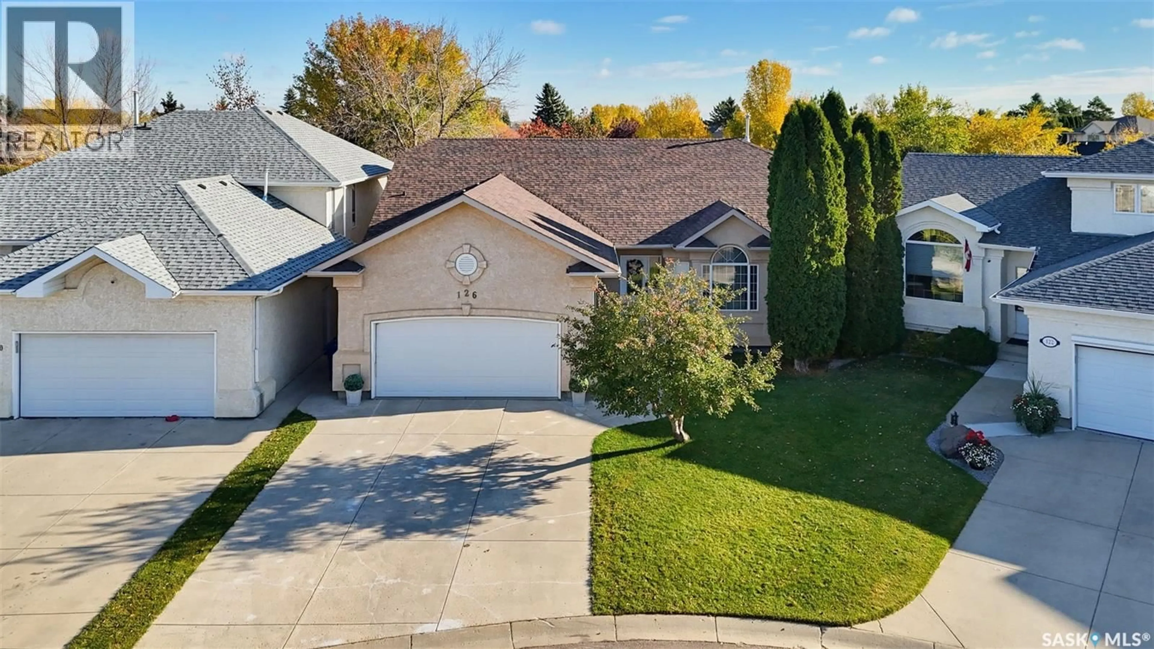 A pic from outside/outdoor area/front of a property/back of a property/a pic from drone, street for 126 WOODS COURT, Saskatoon Saskatchewan S7N4M2