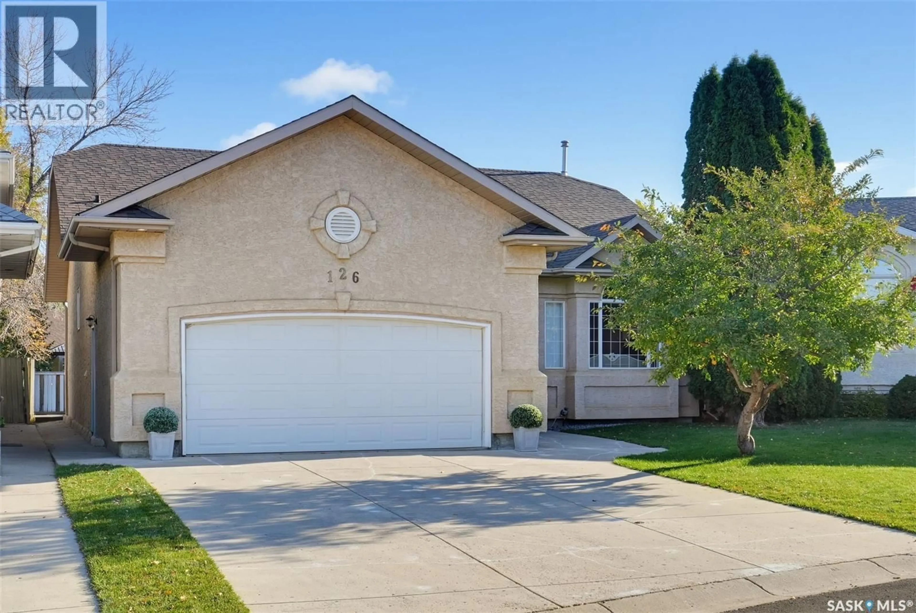 Home with vinyl exterior material, street for 126 WOODS COURT, Saskatoon Saskatchewan S7N4M2