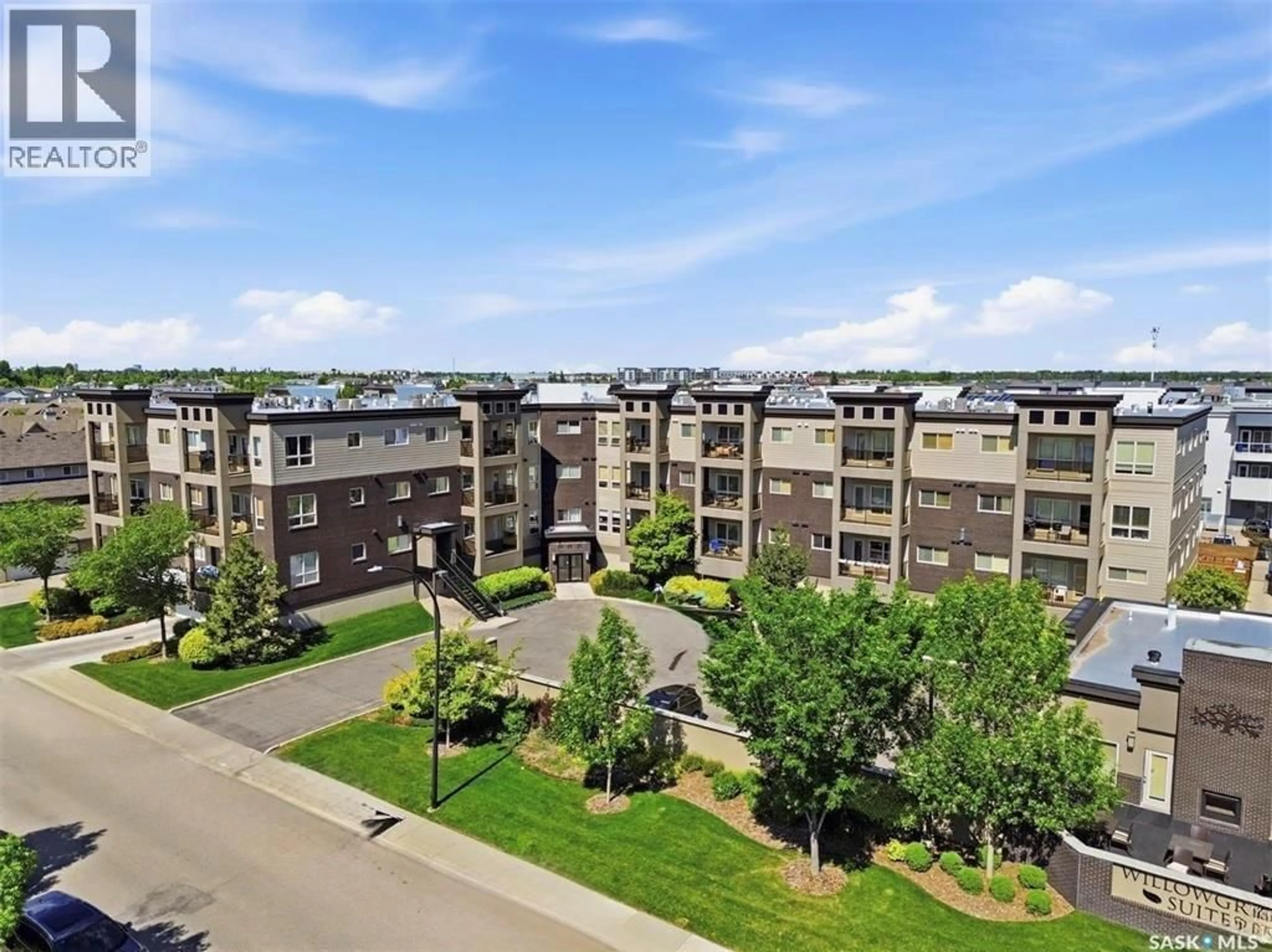 A pic from outside/outdoor area/front of a property/back of a property/a pic from drone, unknown for 111 115 WILLOWGROVE CRESCENT, Saskatoon Saskatchewan S7W0N4