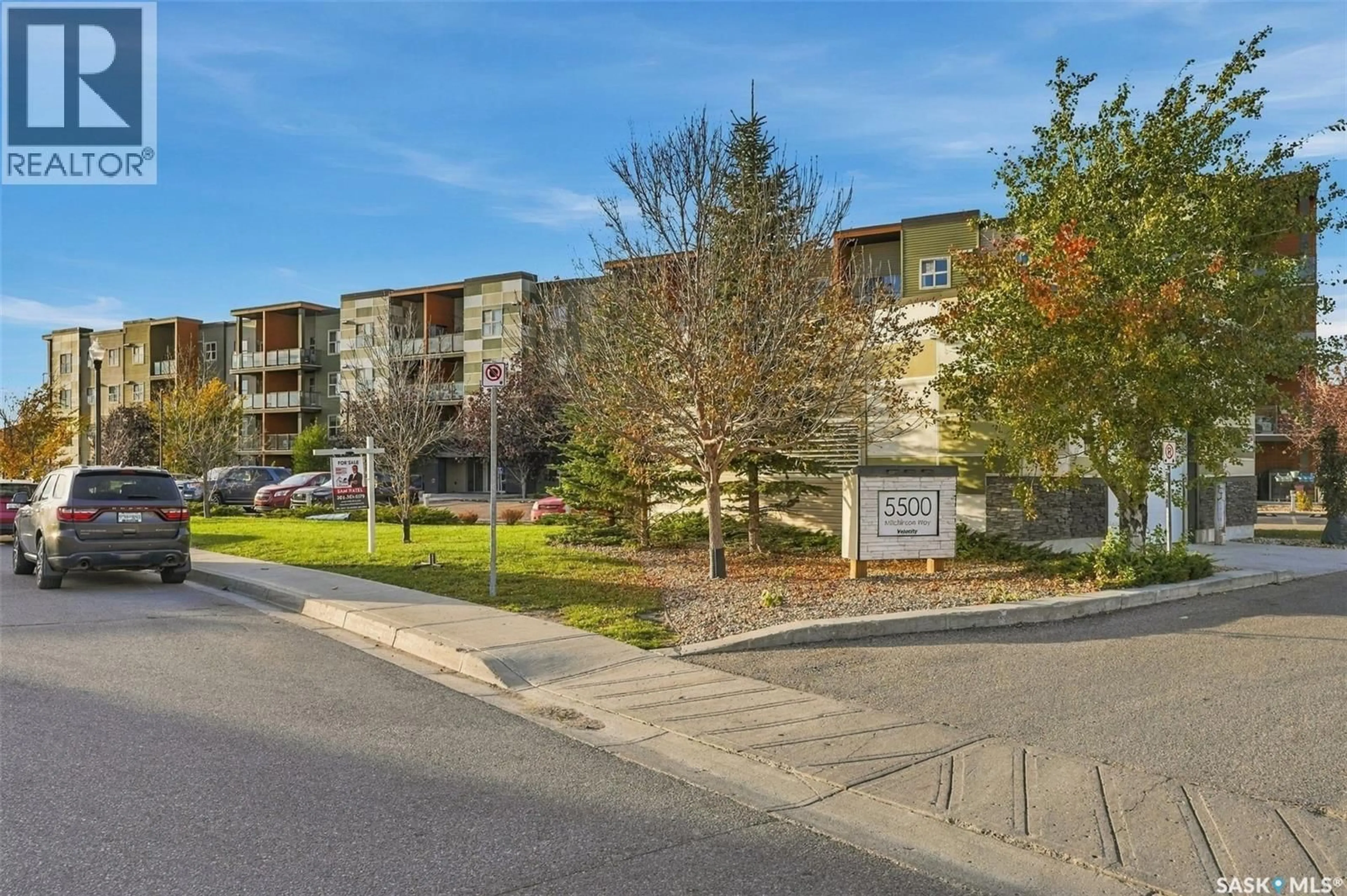 A pic from outside/outdoor area/front of a property/back of a property/a pic from drone, street for 5500 - 2418 MITCHINSON WAY, Regina Saskatchewan S4W0J9