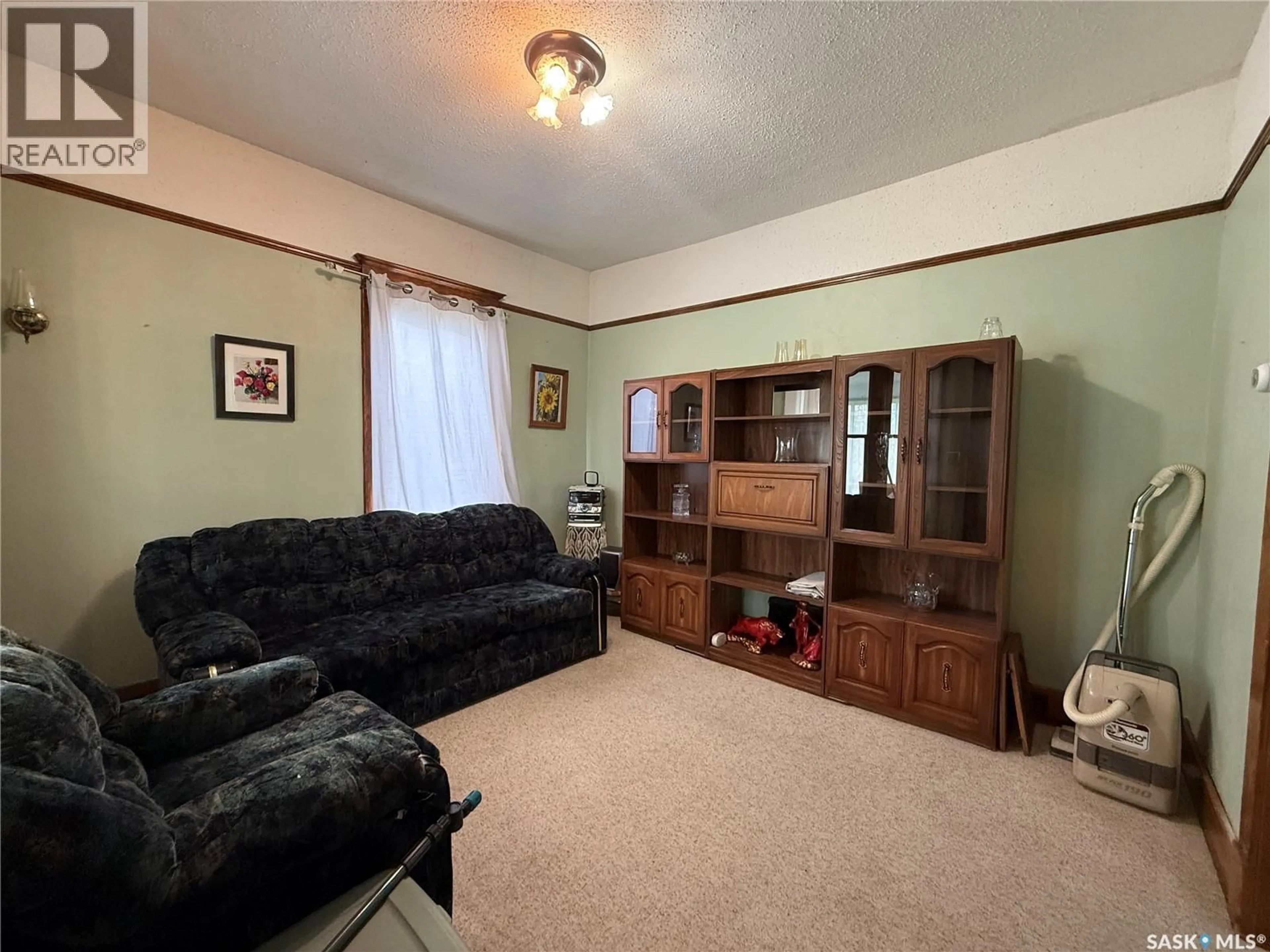 Living room with furniture, unknown for 1721 99TH STREET, North Battleford Saskatchewan S9A0R6