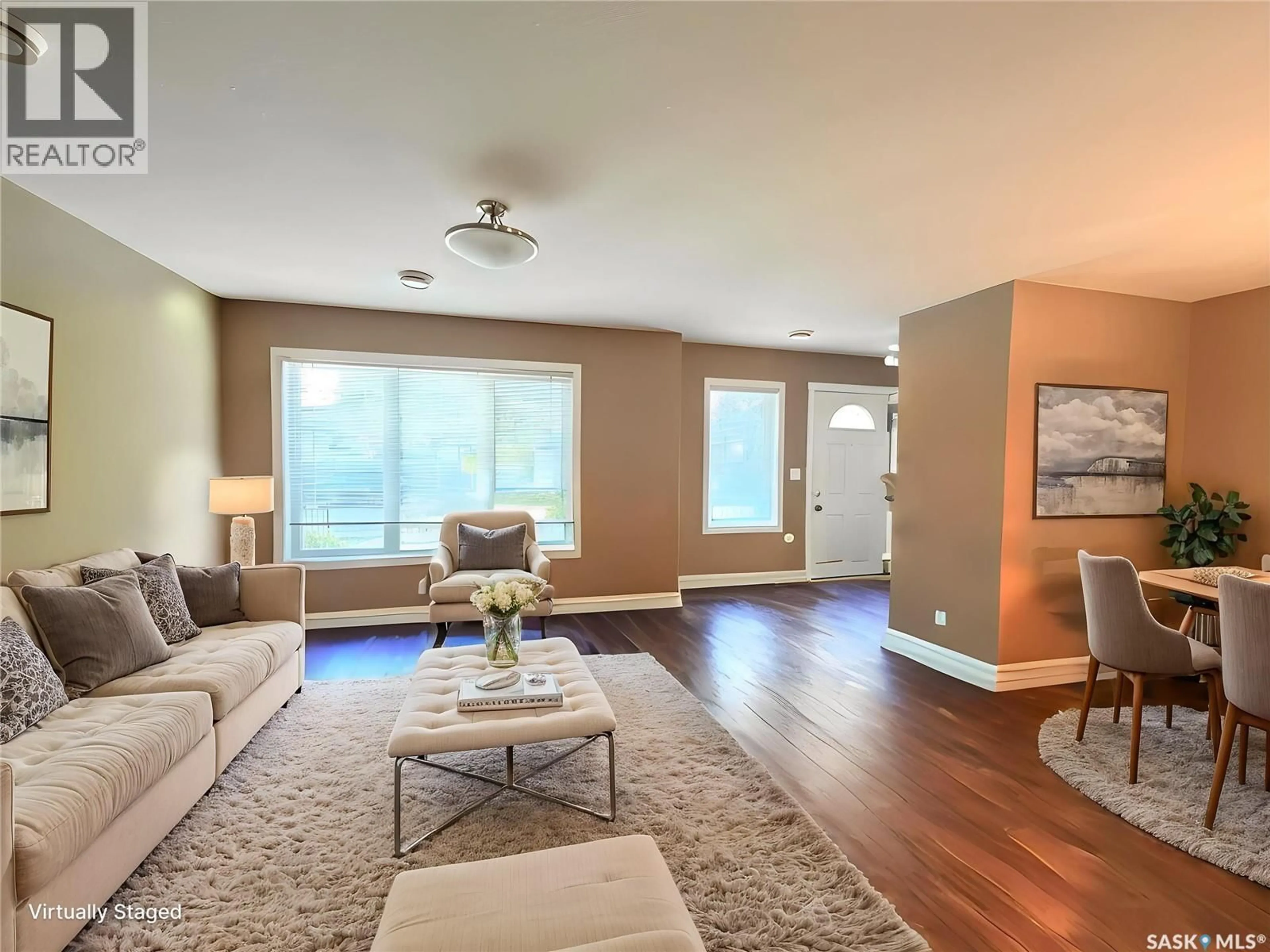 Living room with furniture, wood/laminate floor for 1253 GREY STREET, Regina Saskatchewan S4T1G7