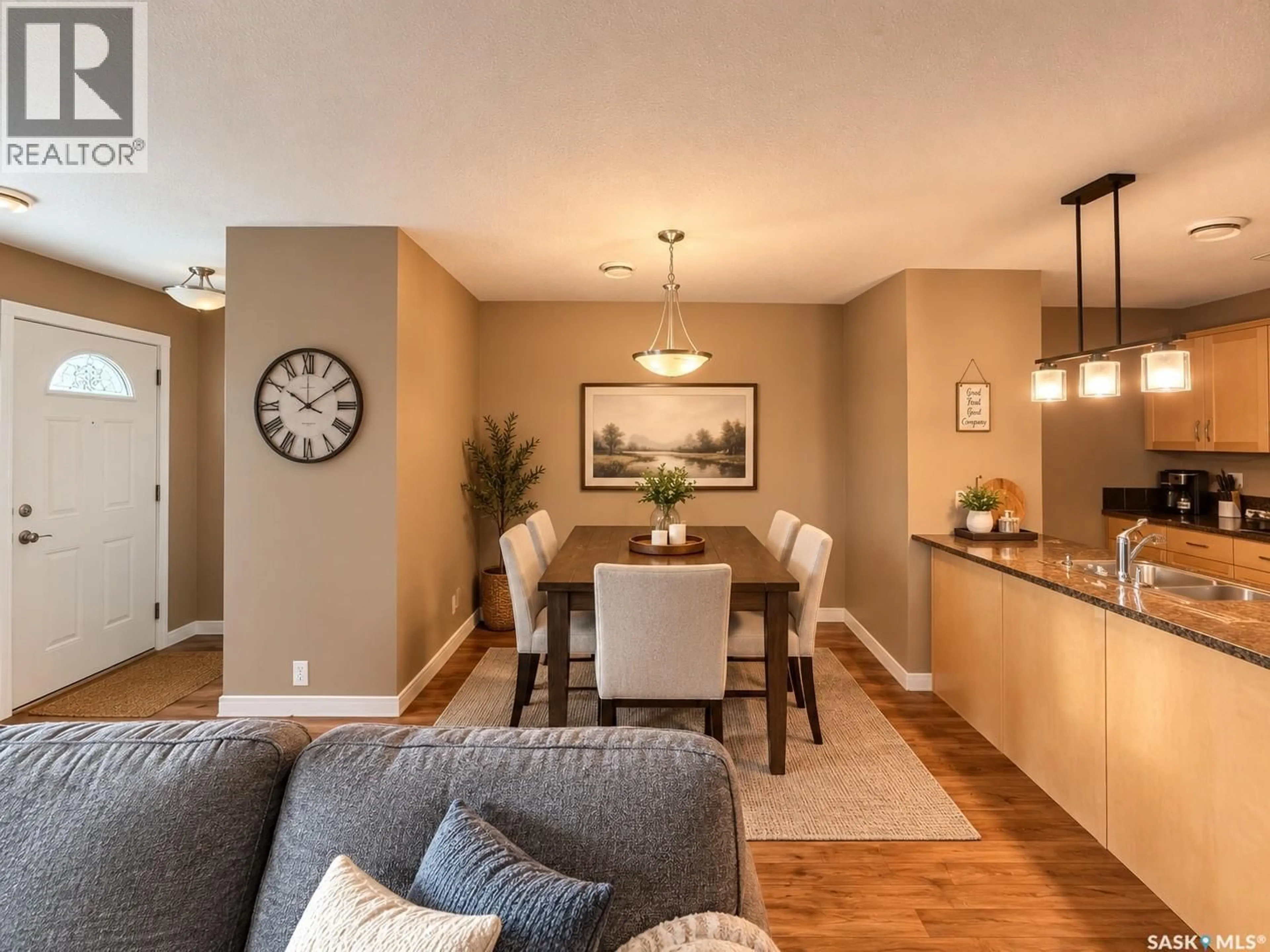 Living room with furniture, wood/laminate floor for 1253 GREY STREET, Regina Saskatchewan S4T1G7