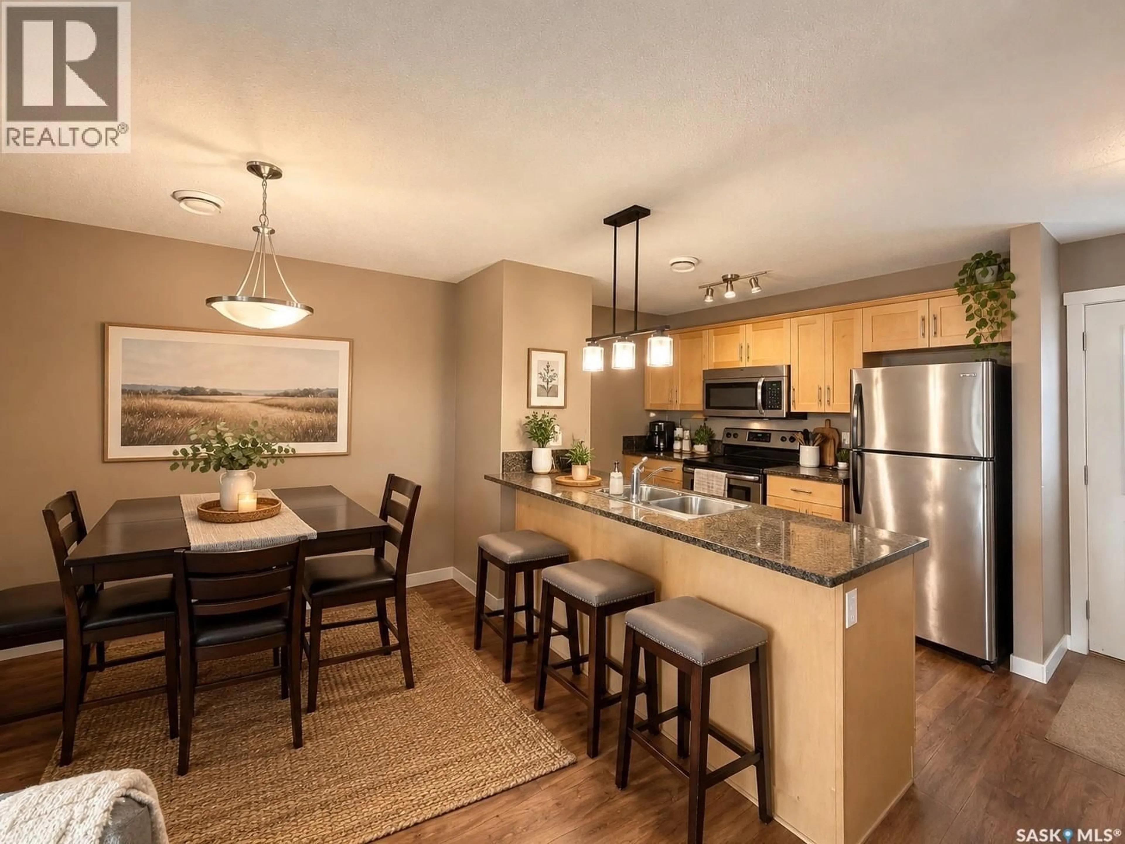 Open concept kitchen, wood/laminate floor for 1253 GREY STREET, Regina Saskatchewan S4T1G7