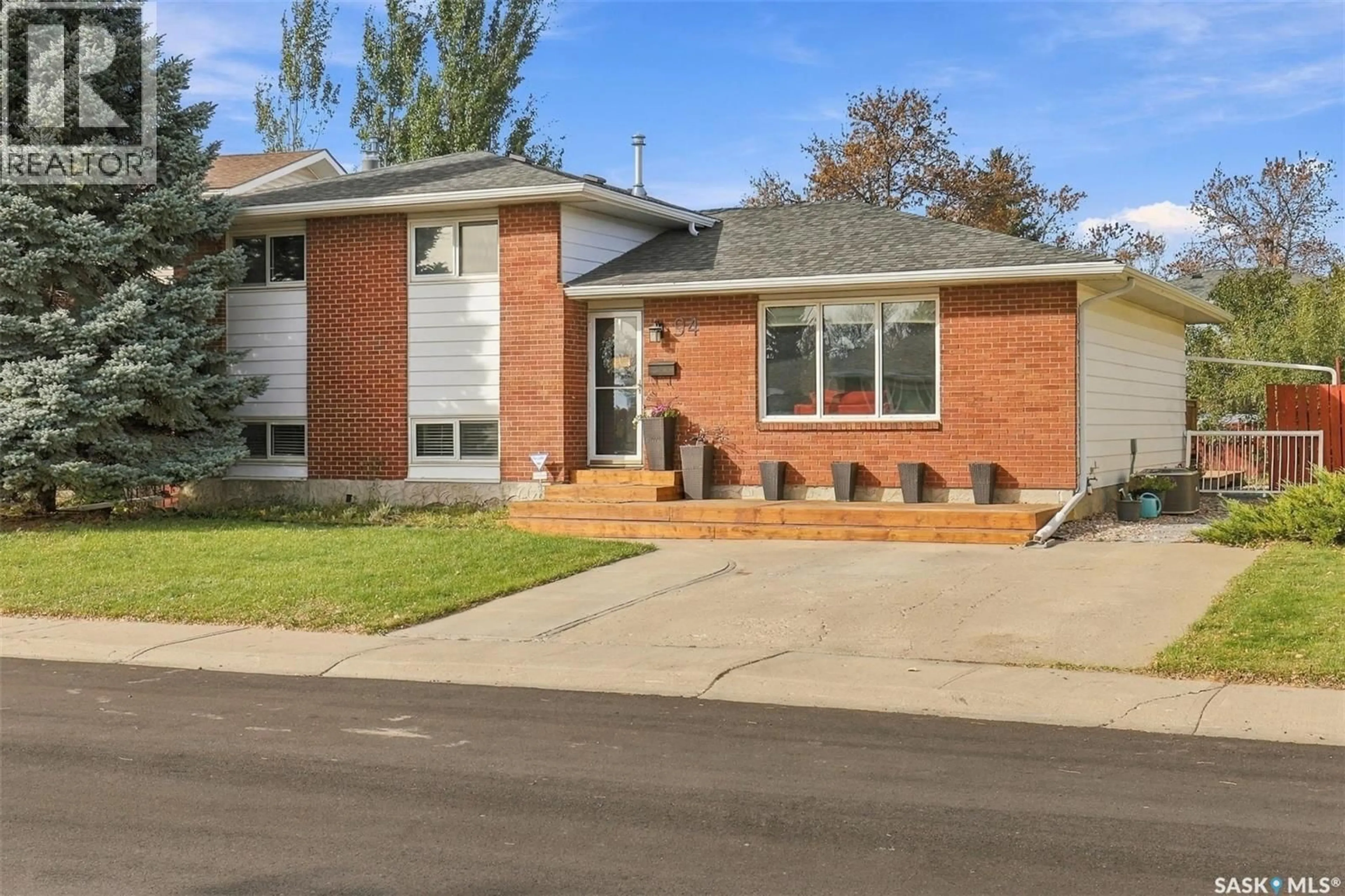 Home with brick exterior material, street for 94 ANDRE AVENUE, Regina Saskatchewan S4T7N2