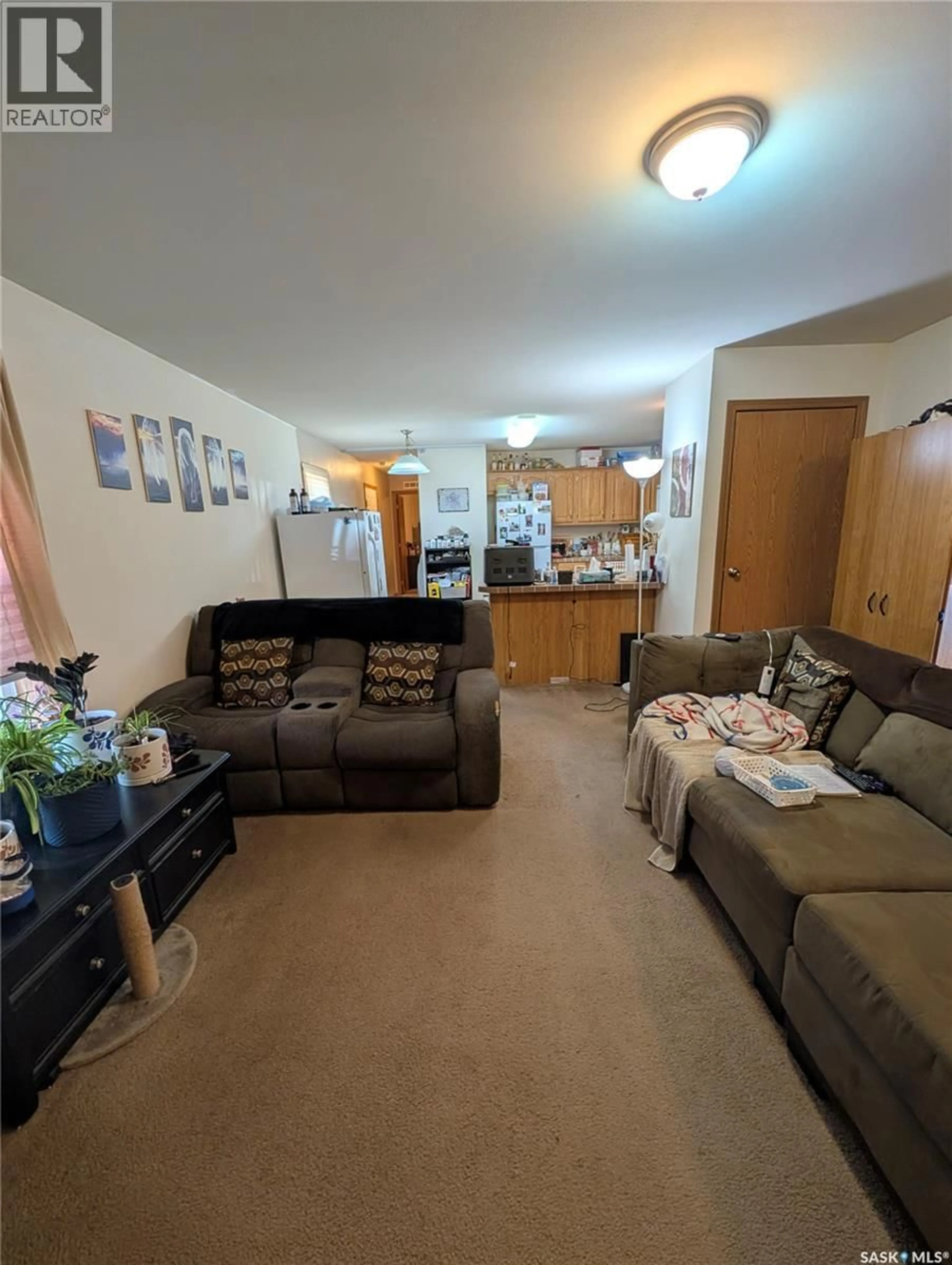 Living room with furniture, unknown for B24 - 1295 9TH AVENUE, Moose Jaw Saskatchewan S6J1C6