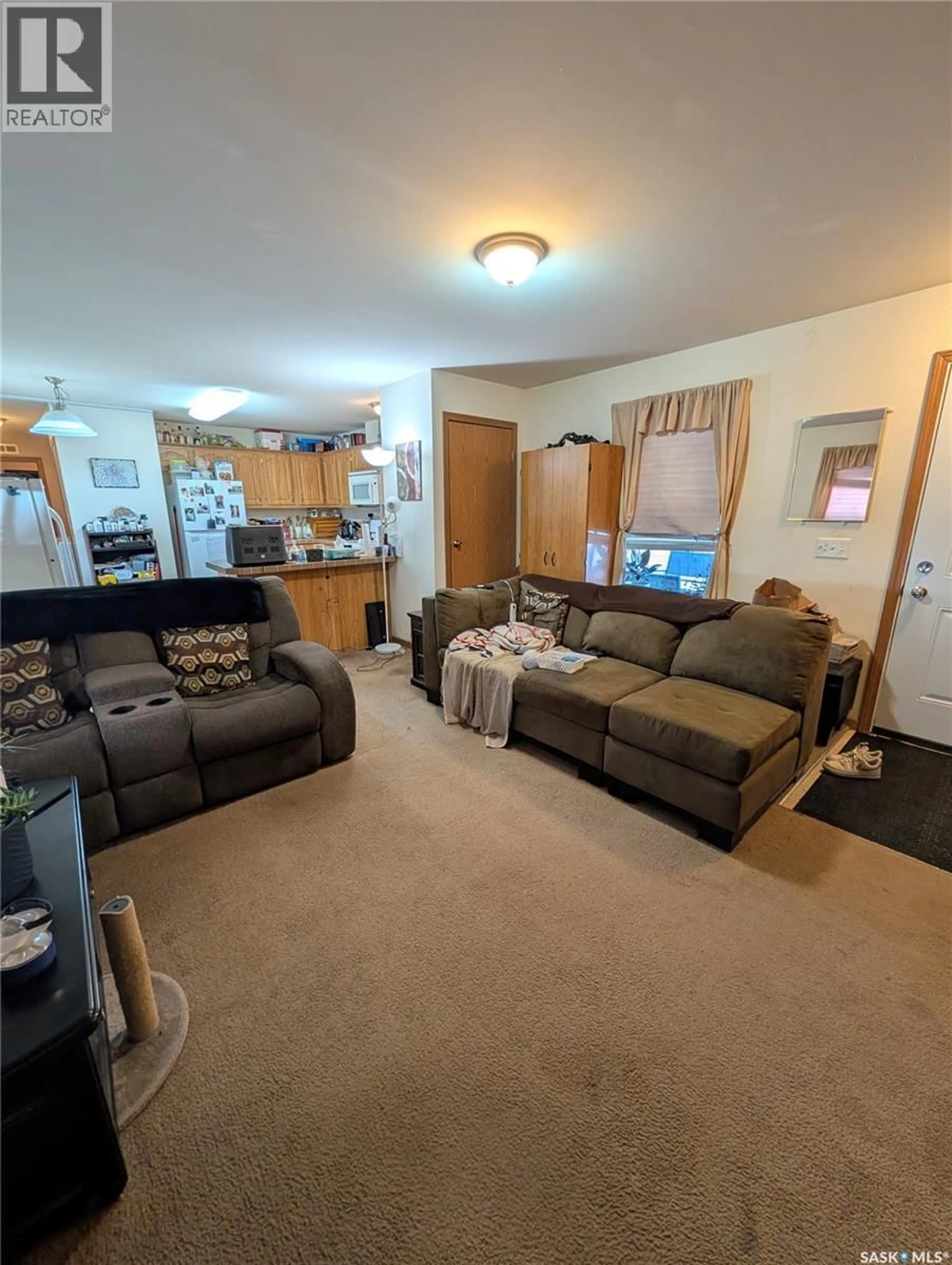 Living room with furniture, unknown for B24 - 1295 9TH AVENUE, Moose Jaw Saskatchewan S6J1C6
