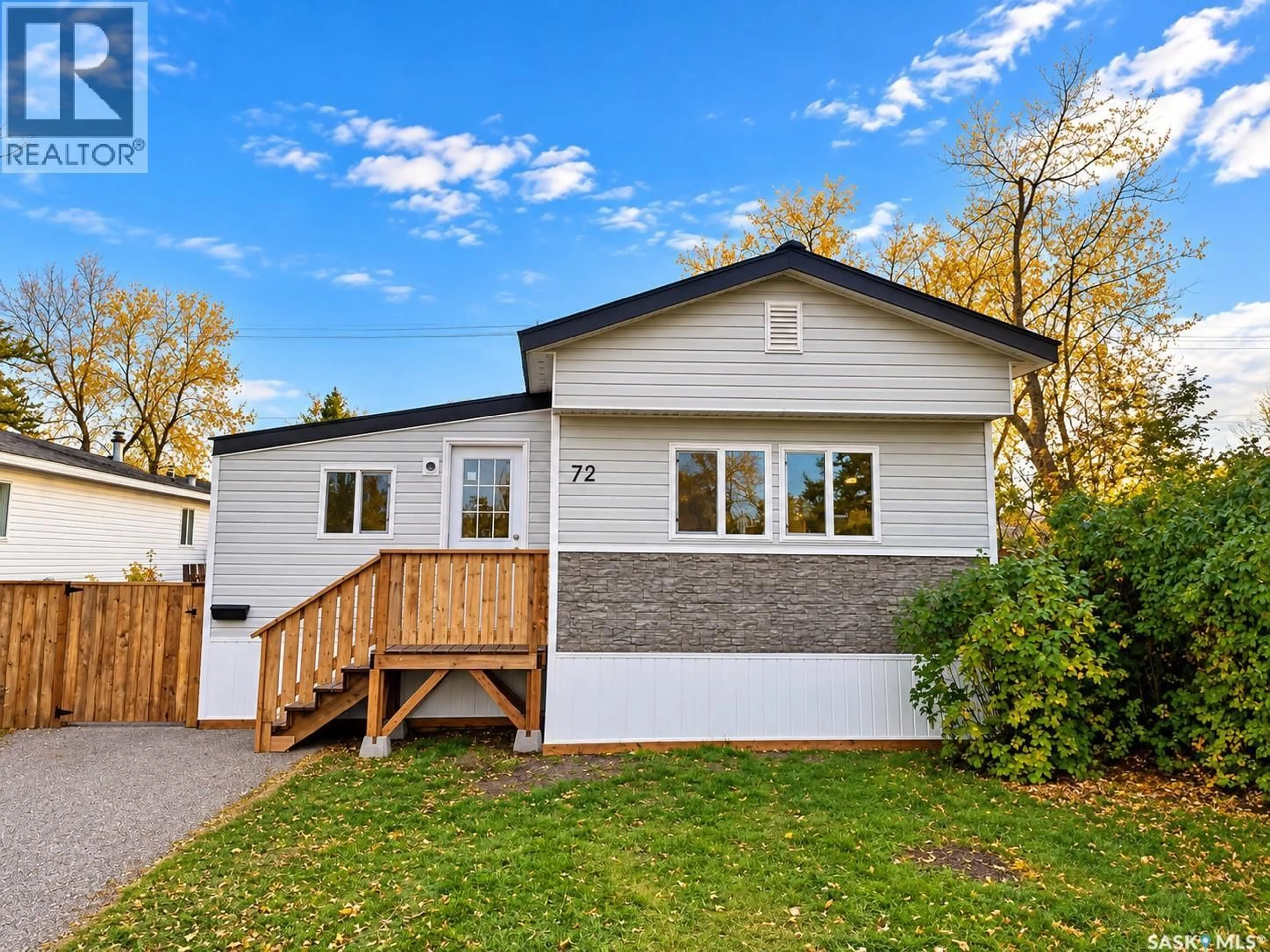 Home with vinyl exterior material, street for 1035 - 72 BOYCHUK DRIVE, Saskatoon Saskatchewan S7H5B2