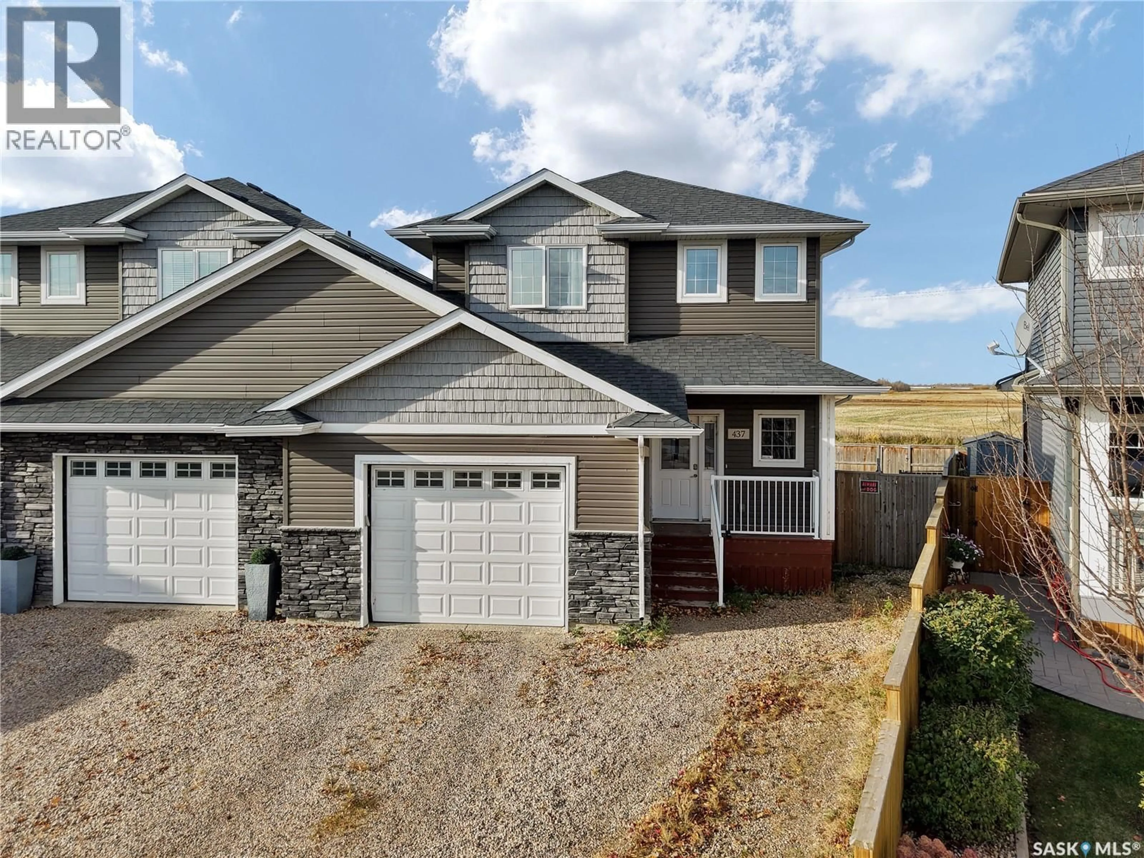 Home with vinyl exterior material, street for 437 REDWOOD CRESCENT, Warman Saskatchewan S0K4S2