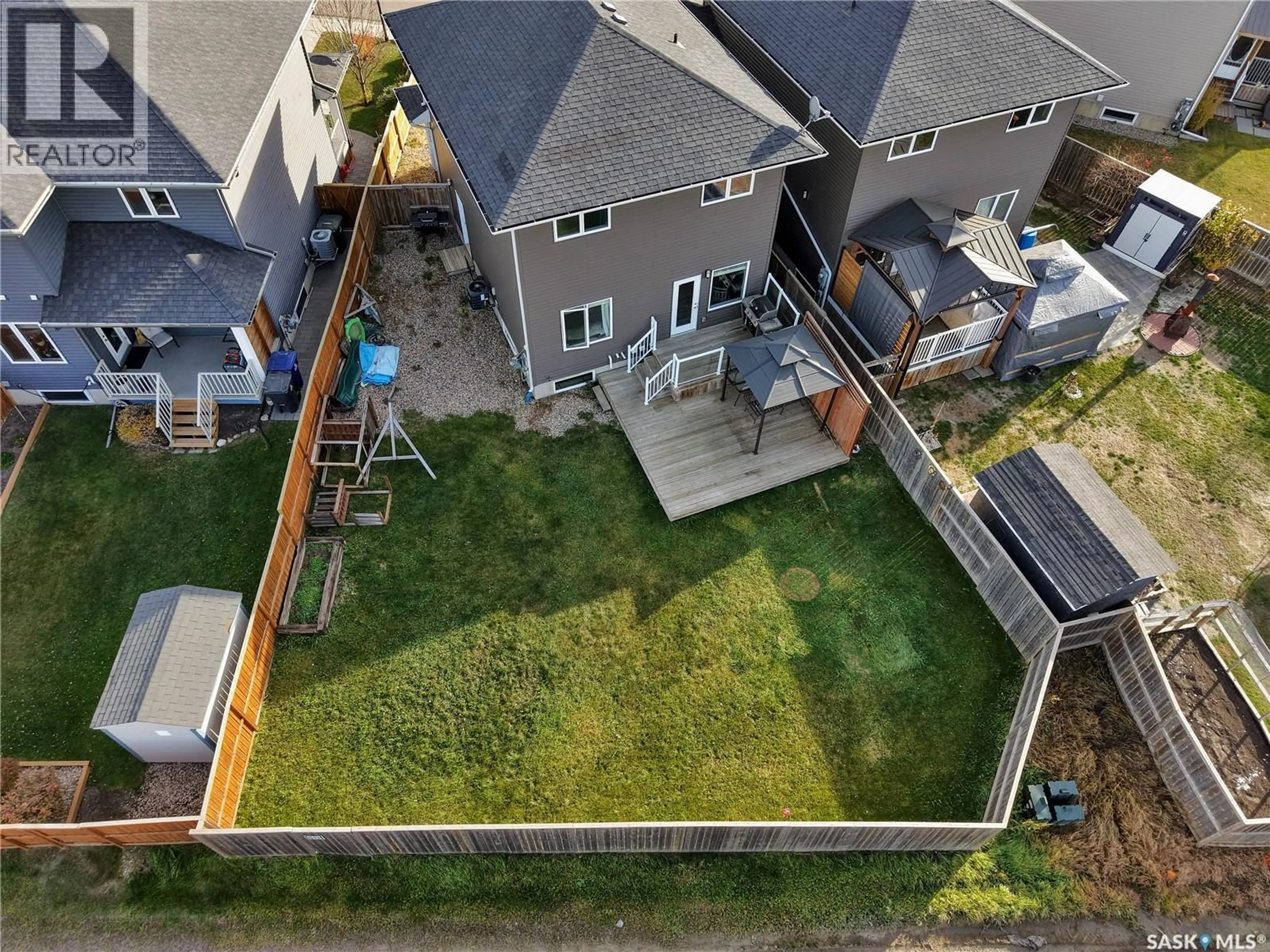 A pic from outside/outdoor area/front of a property/back of a property/a pic from drone, street for 437 REDWOOD CRESCENT, Warman Saskatchewan S0K4S2