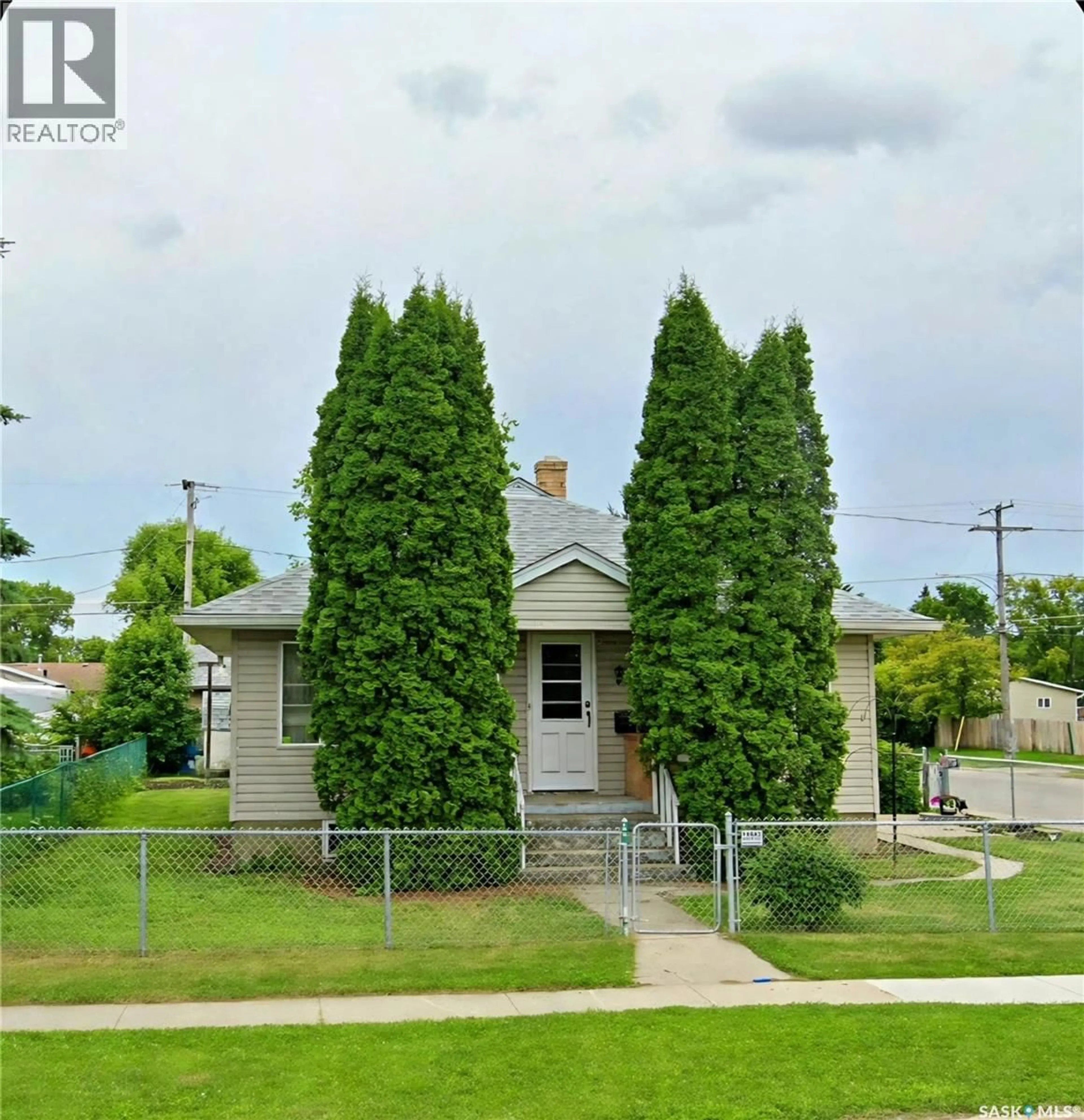 A pic from outside/outdoor area/front of a property/back of a property/a pic from drone, street for E - 805 4A STREET, Prince Albert Saskatchewan S6V0K6