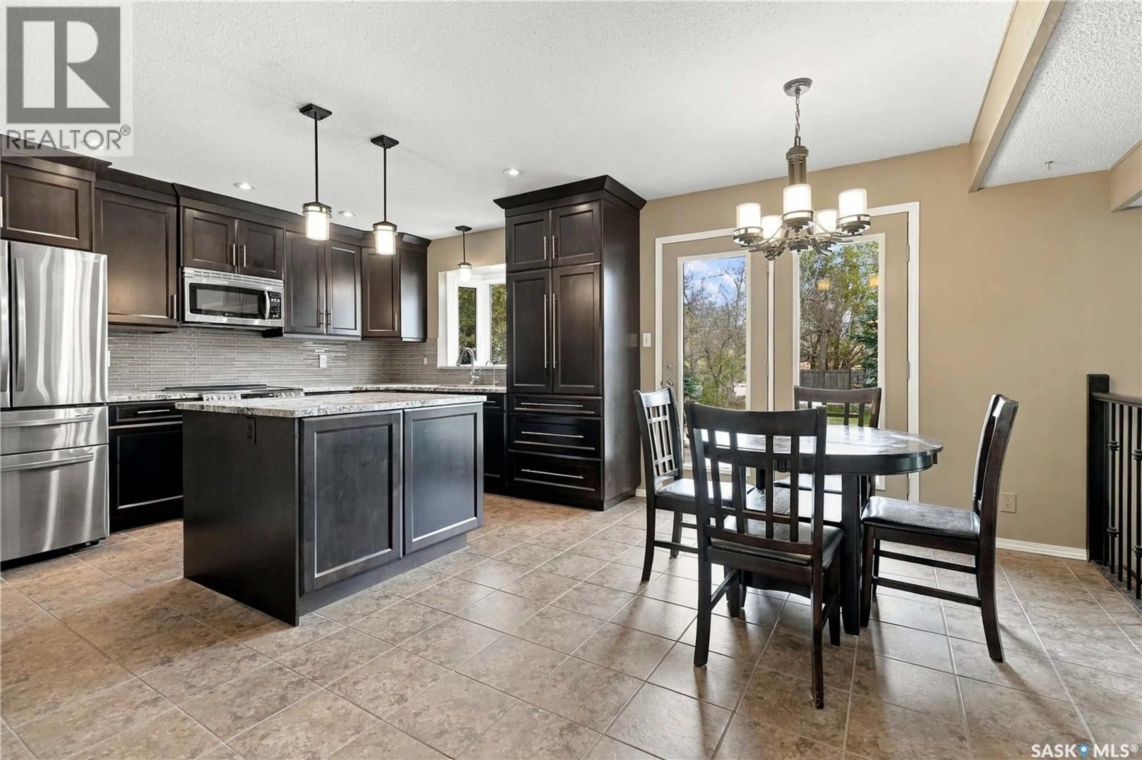 Open concept kitchen, ceramic/tile floor for 65 MEADOW ROAD, White City Saskatchewan S4L5B1
