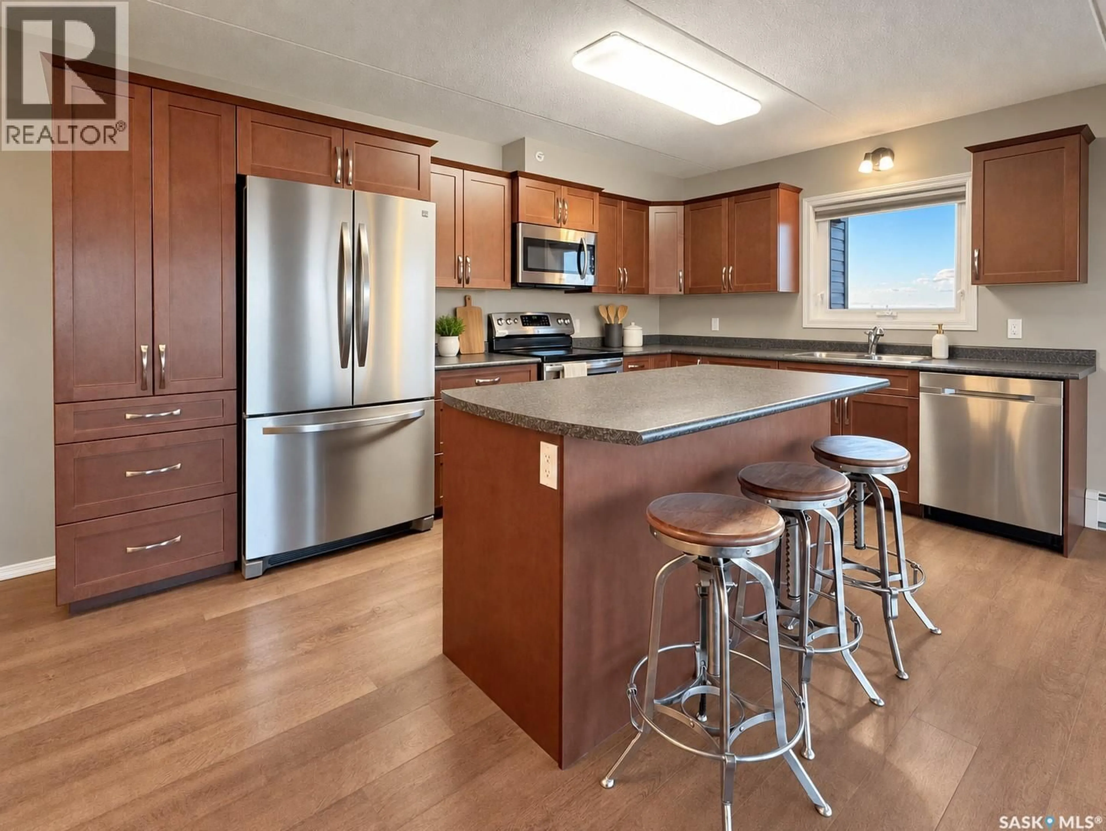 Open concept kitchen, unknown for 308 - 2426 BUHLER AVENUE, North Battleford Saskatchewan S9A1R5