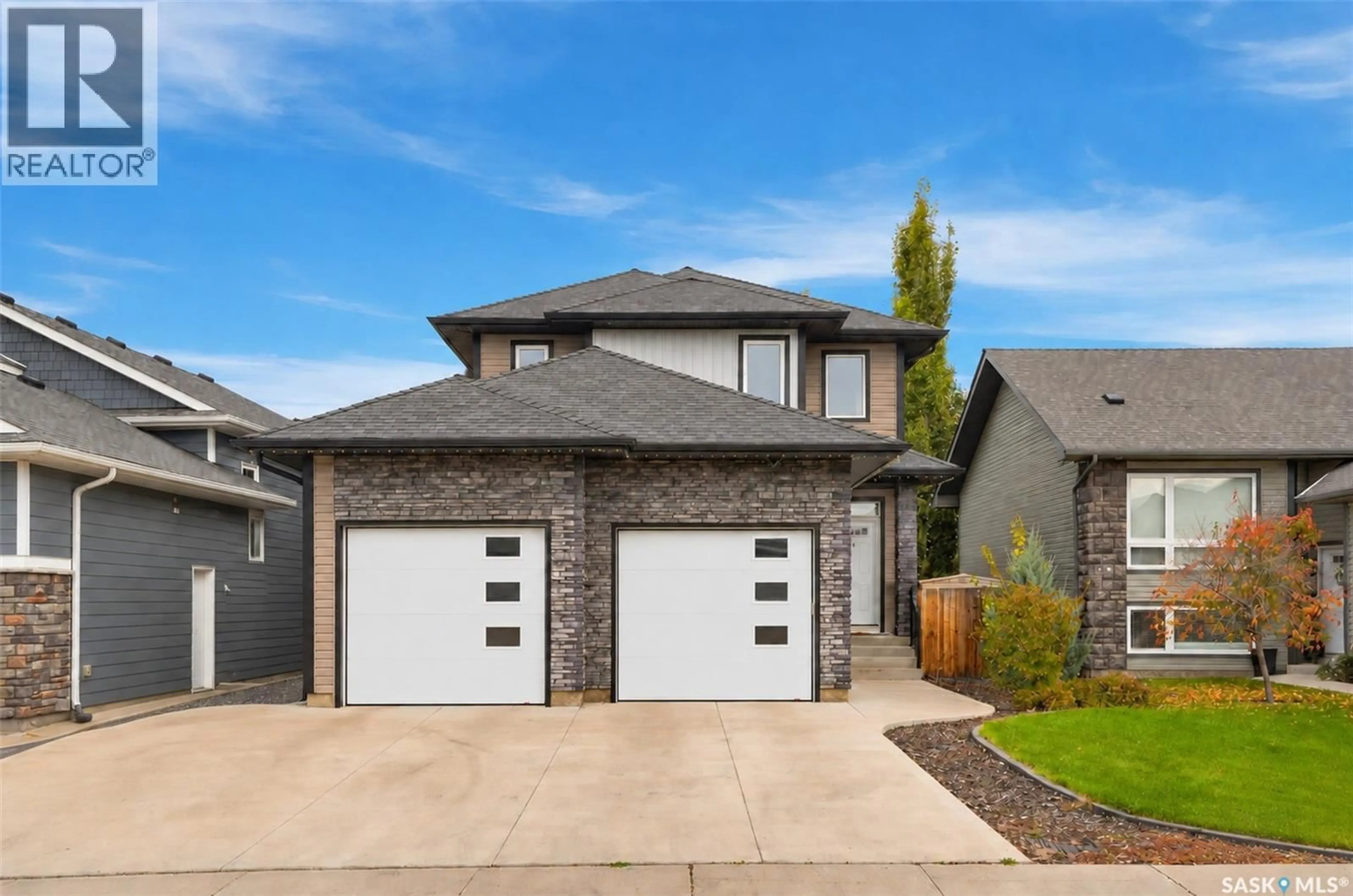 Home with brick exterior material, street for 1415 PRINGLE CRESCENT, Saskatoon Saskatchewan S7T0S6