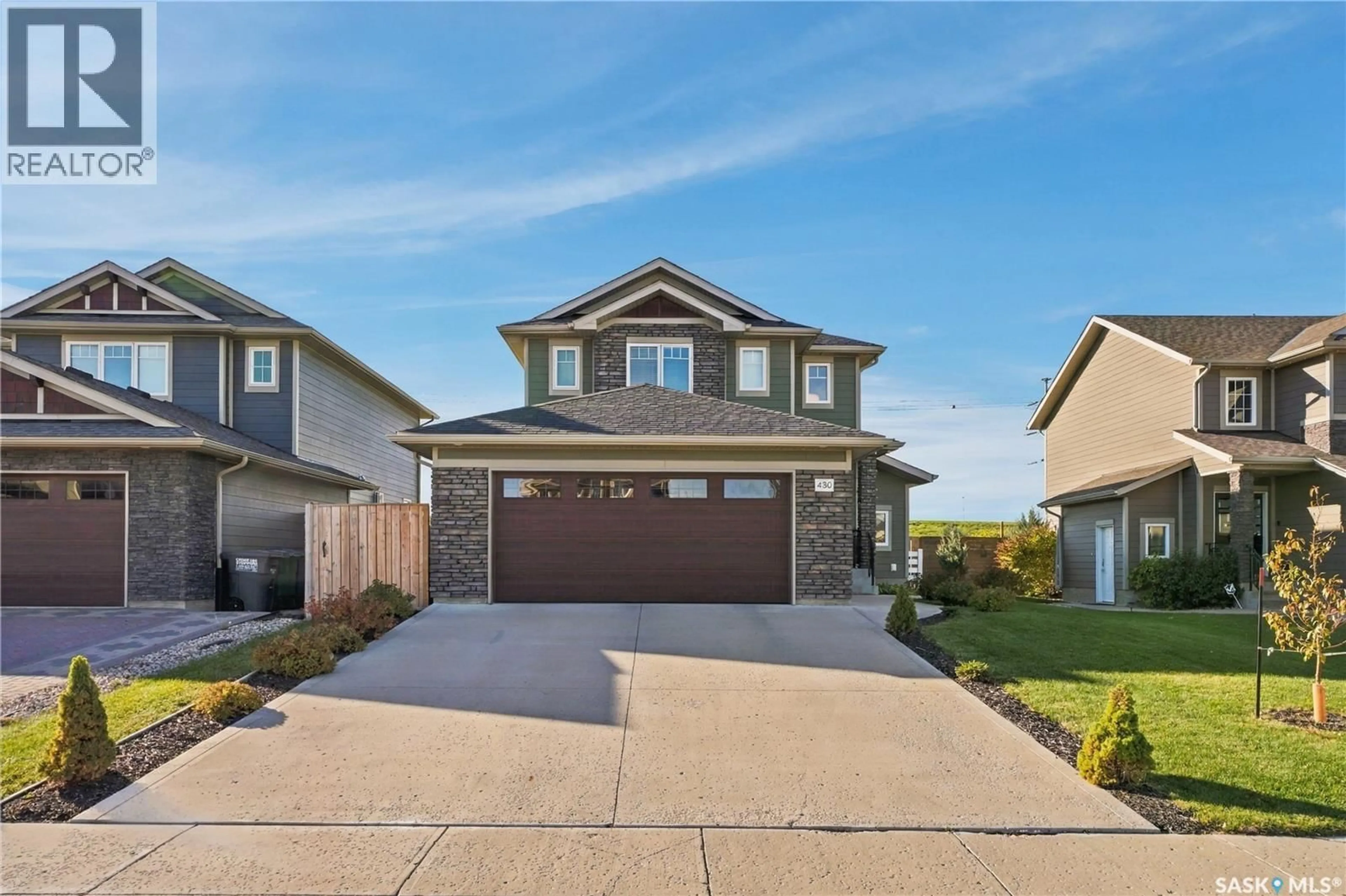 Home with vinyl exterior material, street for 430 PICHLER CRESCENT, Saskatoon Saskatchewan S7V0H2