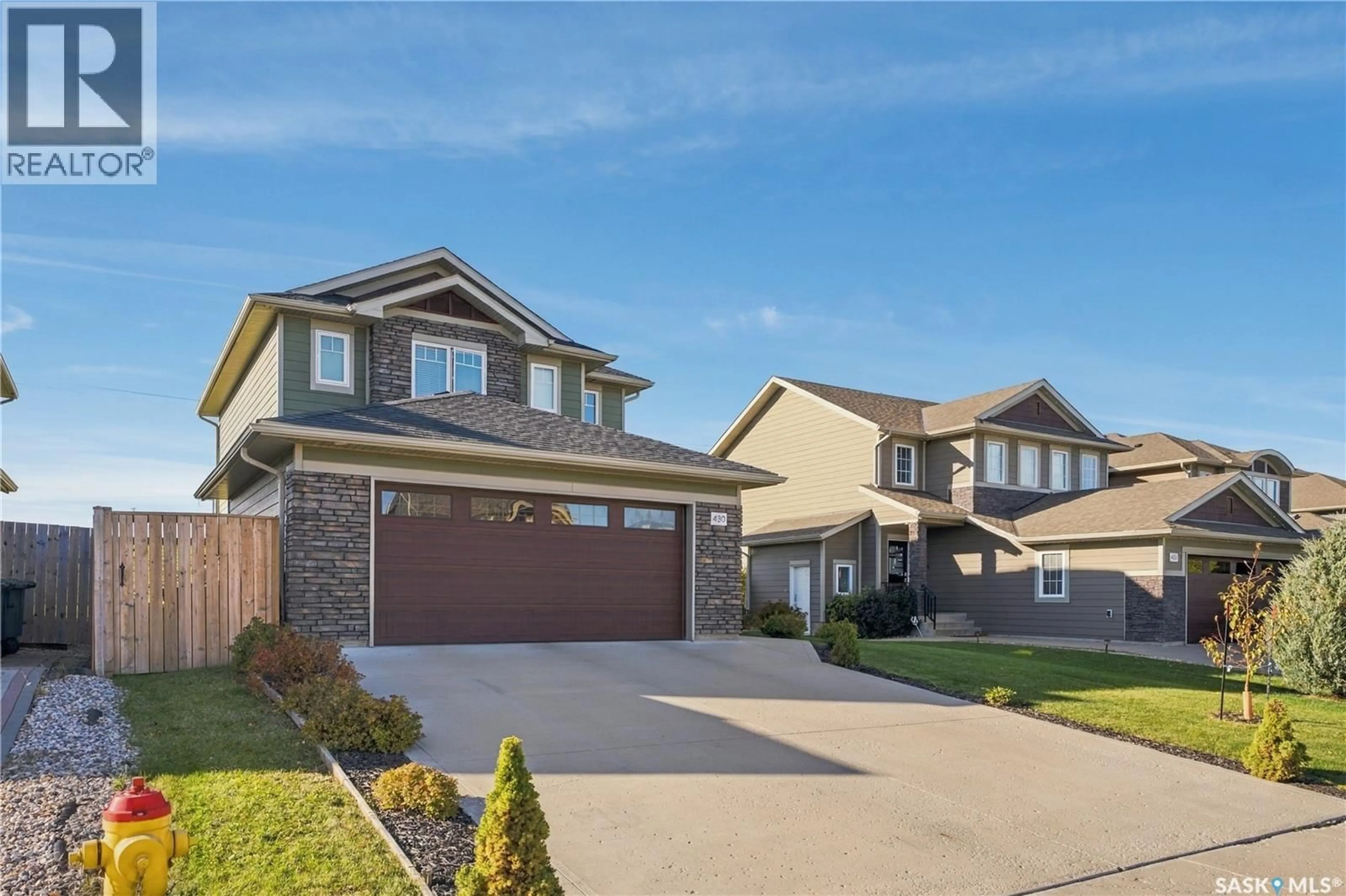 Home with vinyl exterior material, street for 430 PICHLER CRESCENT, Saskatoon Saskatchewan S7V0H2