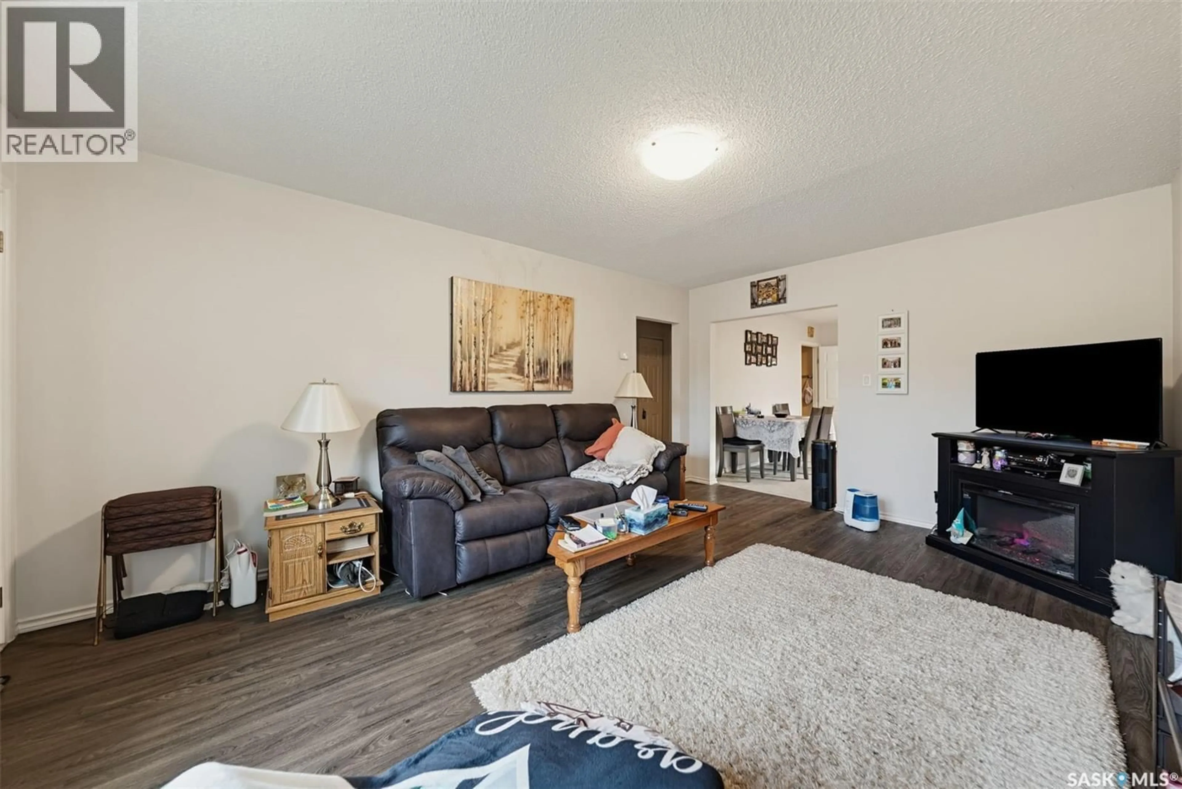 Living room with furniture, wood/laminate floor for 523 ST ANTHONY STREET, Bruno Saskatchewan S0K0S0