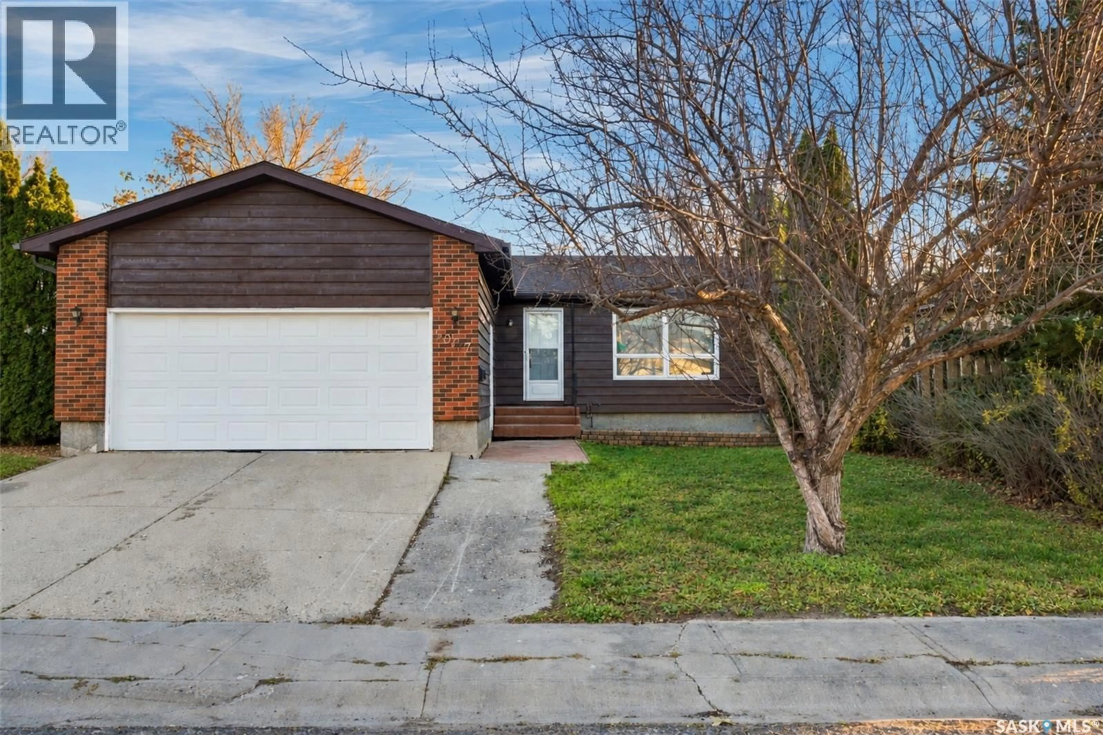 Home with vinyl exterior material, street for 5907 HAGUE CRESCENT, Regina Saskatchewan S4X3K6