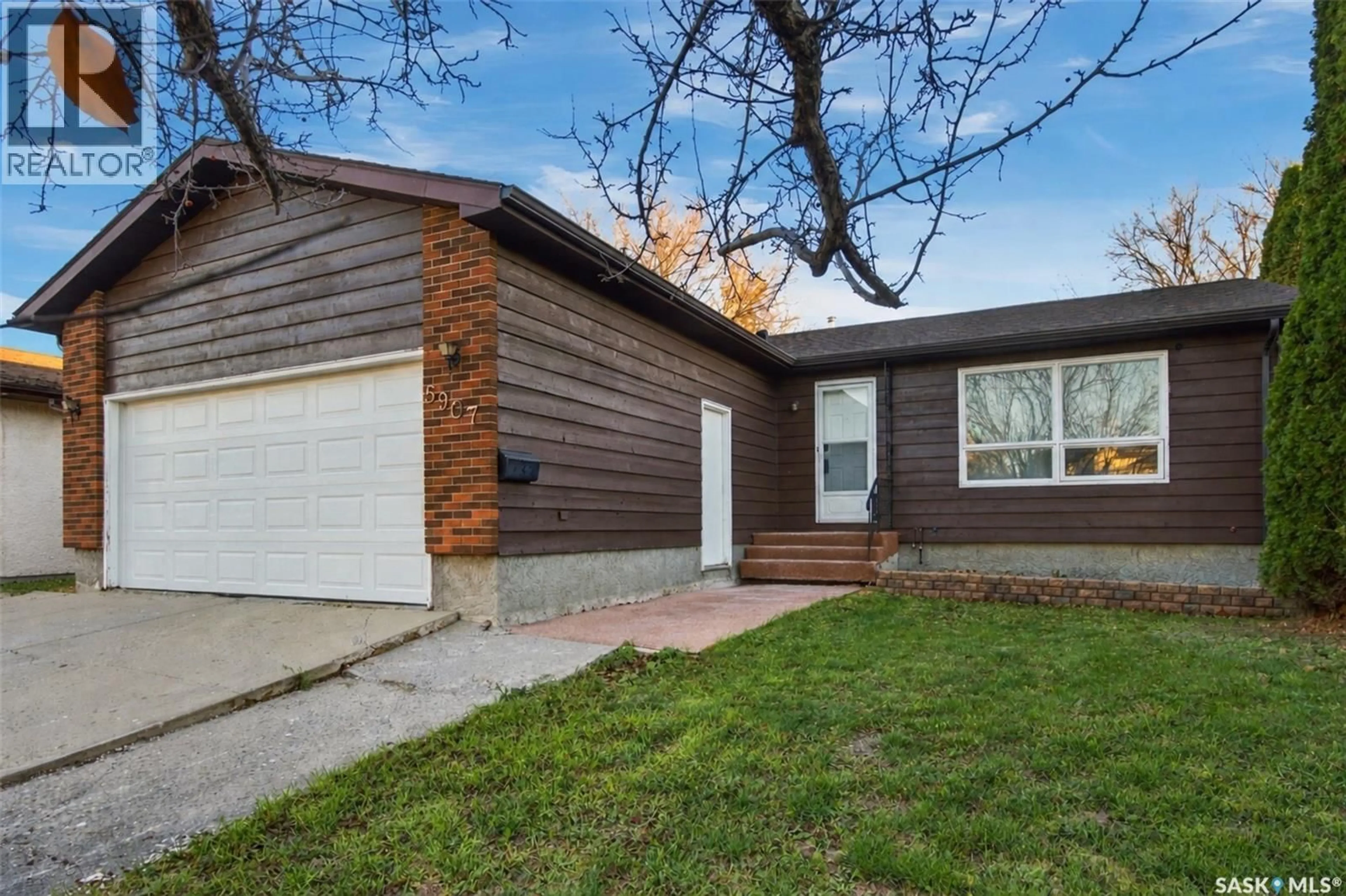 Home with vinyl exterior material, street for 5907 HAGUE CRESCENT, Regina Saskatchewan S4X3K6