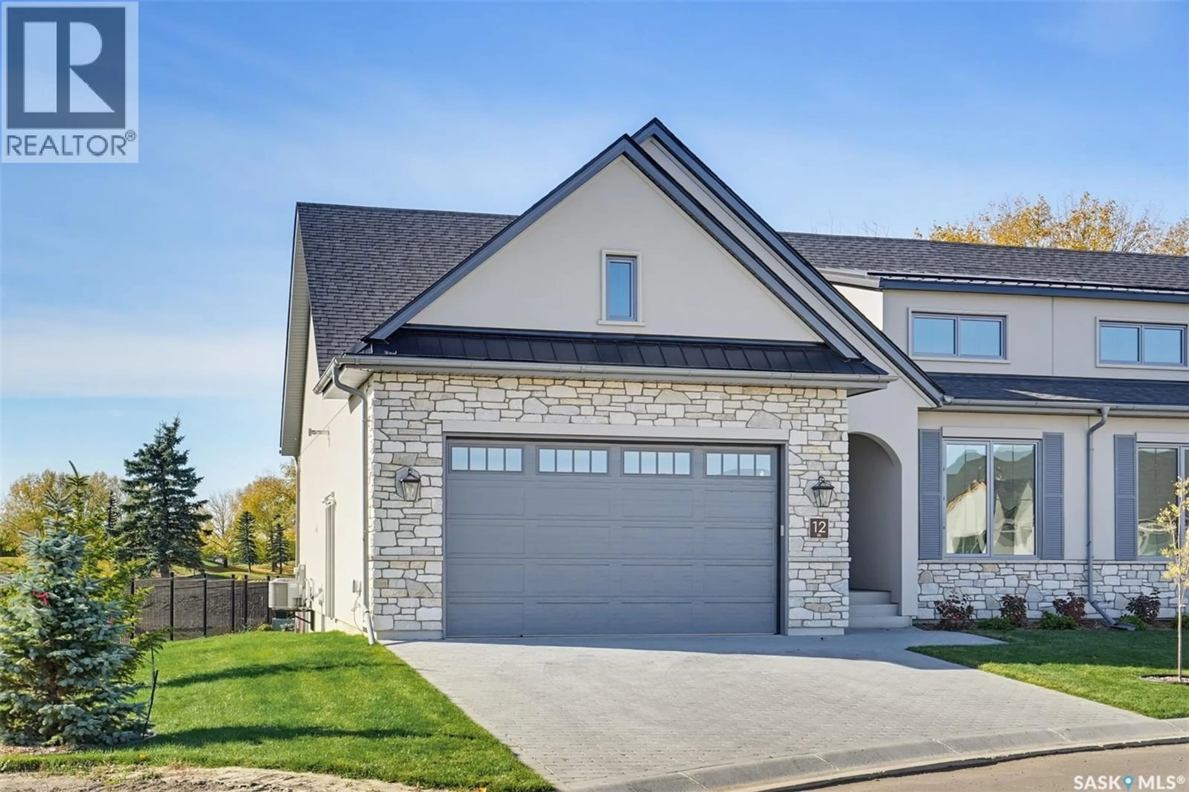 Home with brick exterior material, street for 12 350 CARTWRIGHT STREET, Saskatoon Saskatchewan S7T1B1