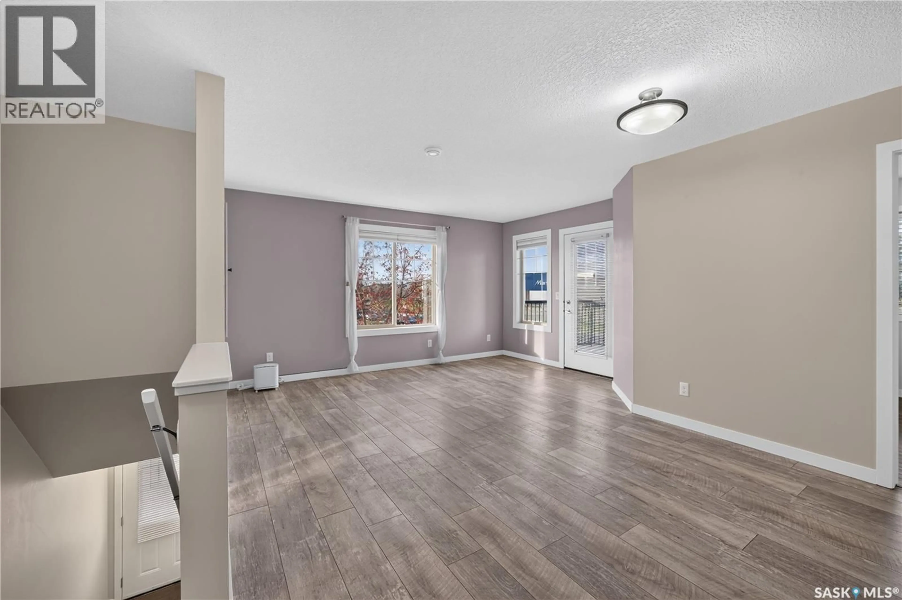 Living room with furniture, unknown for 5031 - 59 JAMES HILL ROAD, Regina Saskatchewan S4W0B9