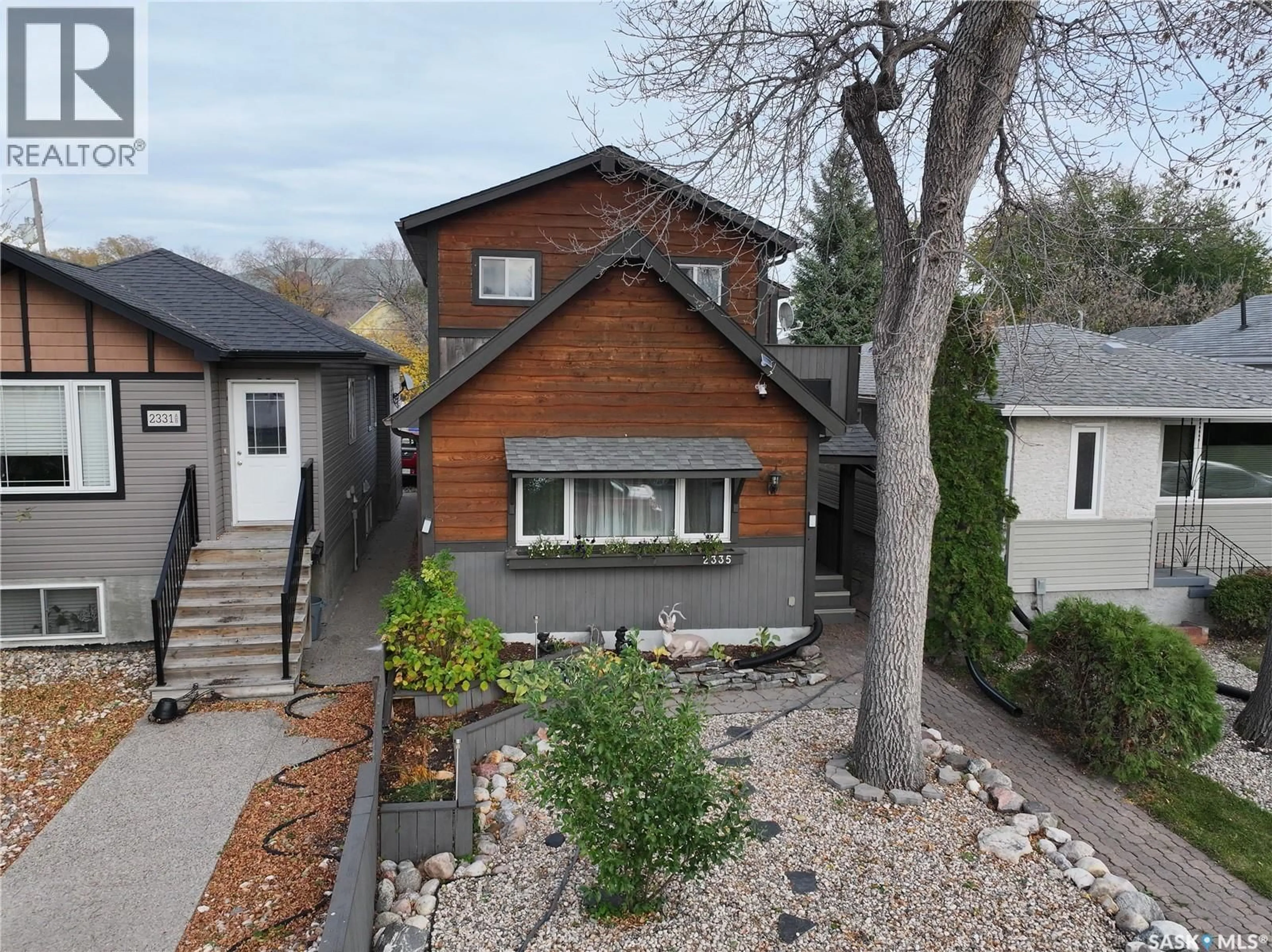 Home with vinyl exterior material, street for 2335 REYNOLDS STREET, Regina Saskatchewan S4N3N6