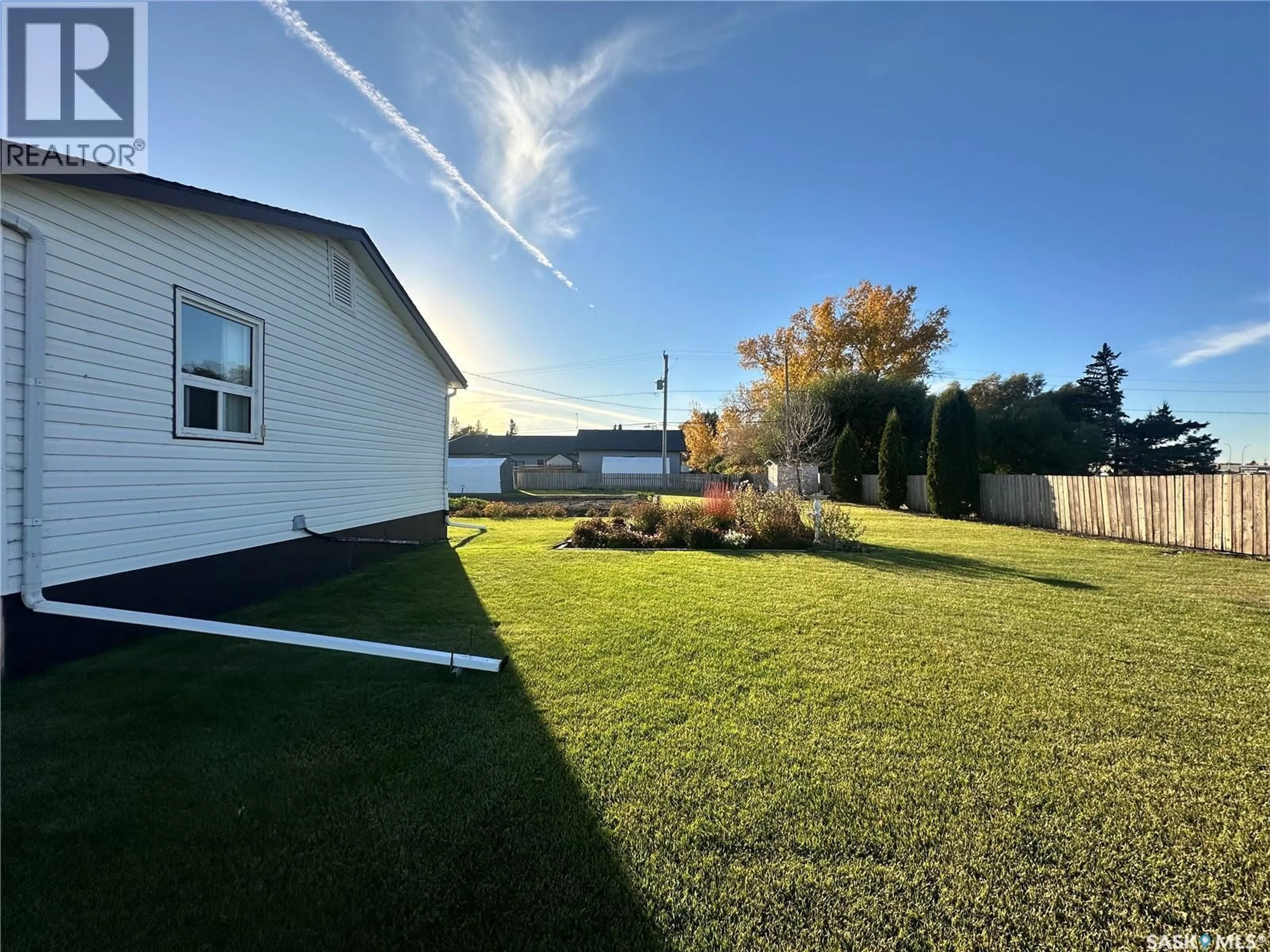 A pic from outside/outdoor area/front of a property/back of a property/a pic from drone, water/lake/river/ocean view for 50 RAE AVENUE, Yorkton Saskatchewan S3N3L4