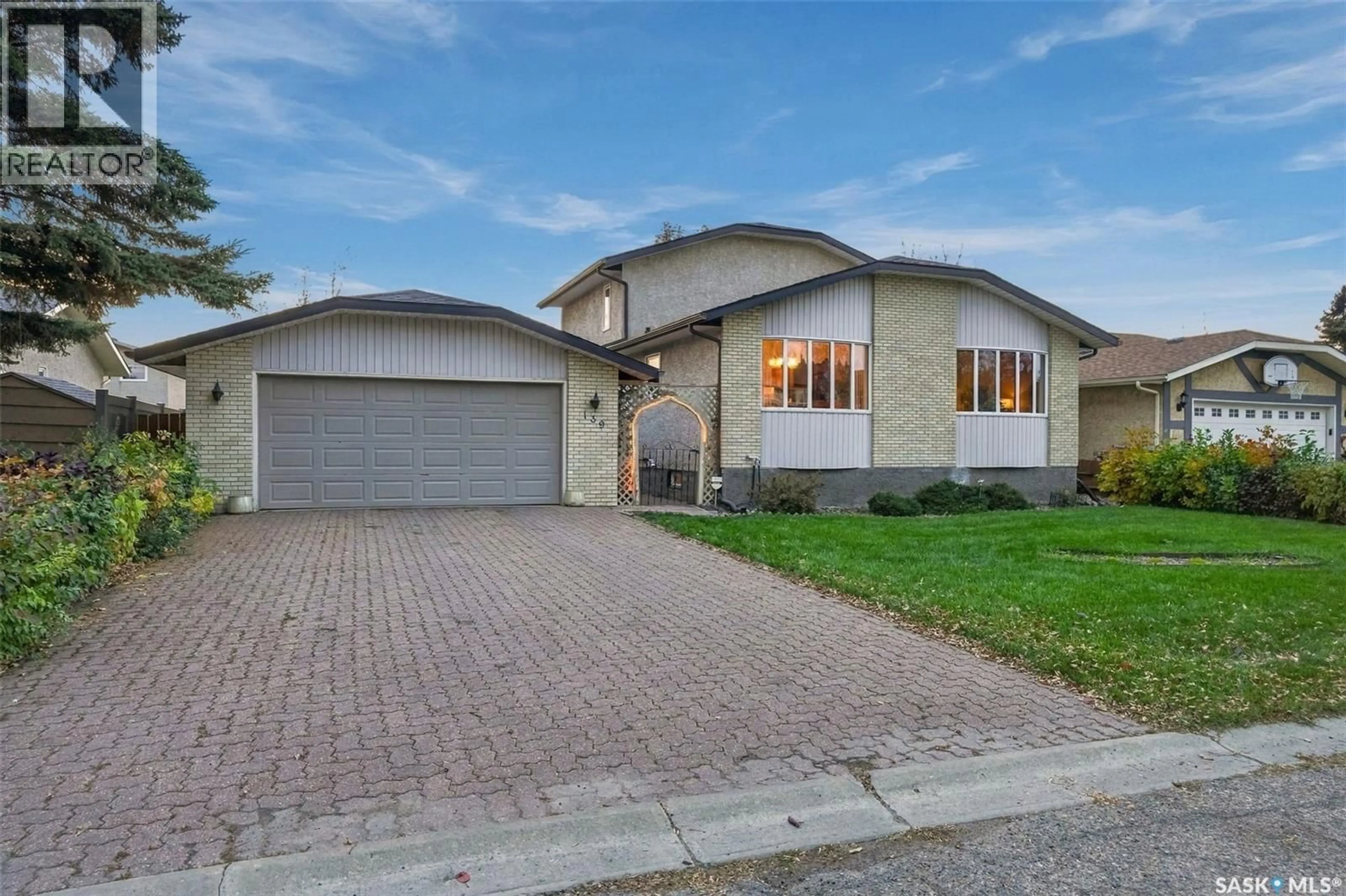 Home with brick exterior material, street for 139 ASPEN PLACE, Regina Saskatchewan S4X3B4