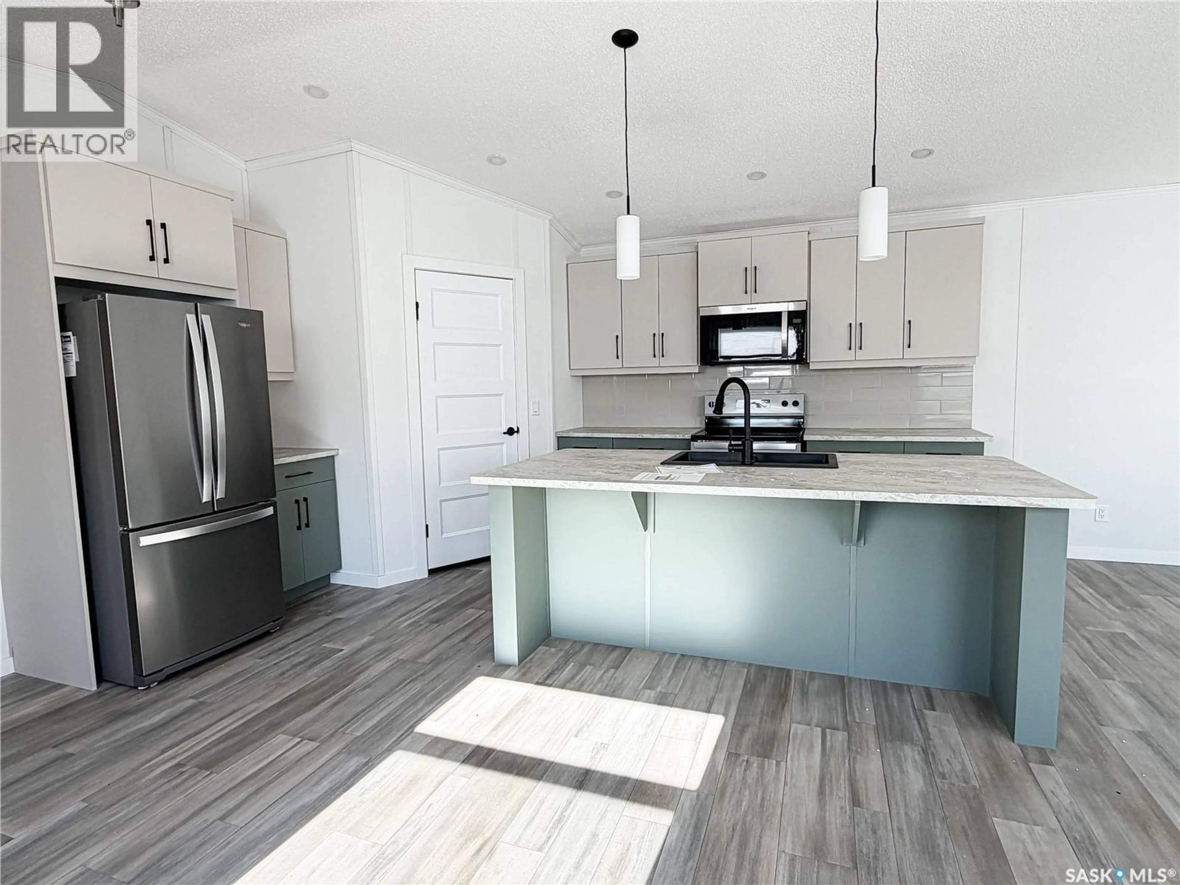 Open concept kitchen, unknown for 305 7TH STREET, Meadow Lake Saskatchewan S9X1J1