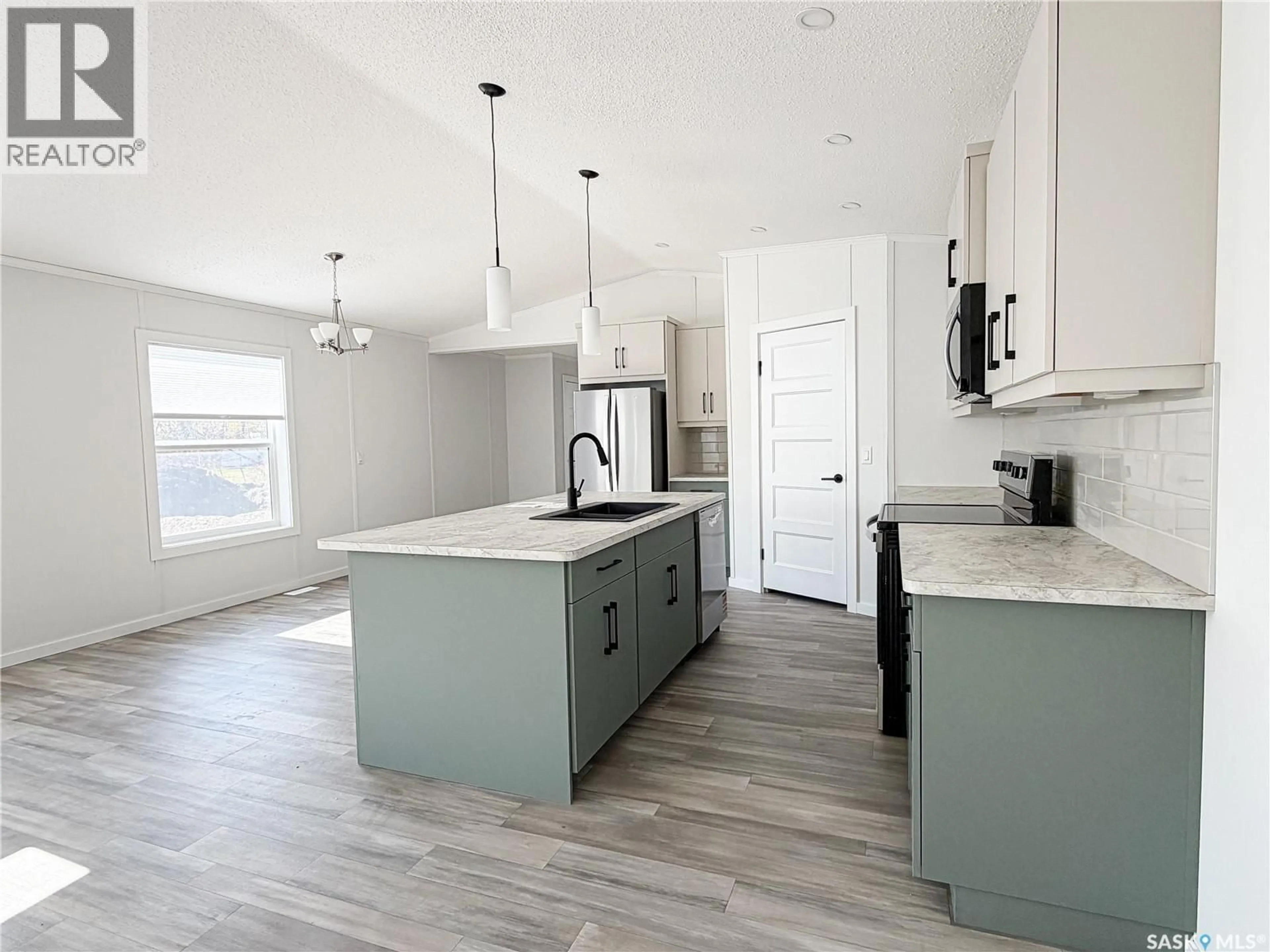 Open concept kitchen, unknown for 305 7TH STREET, Meadow Lake Saskatchewan S9X1J1