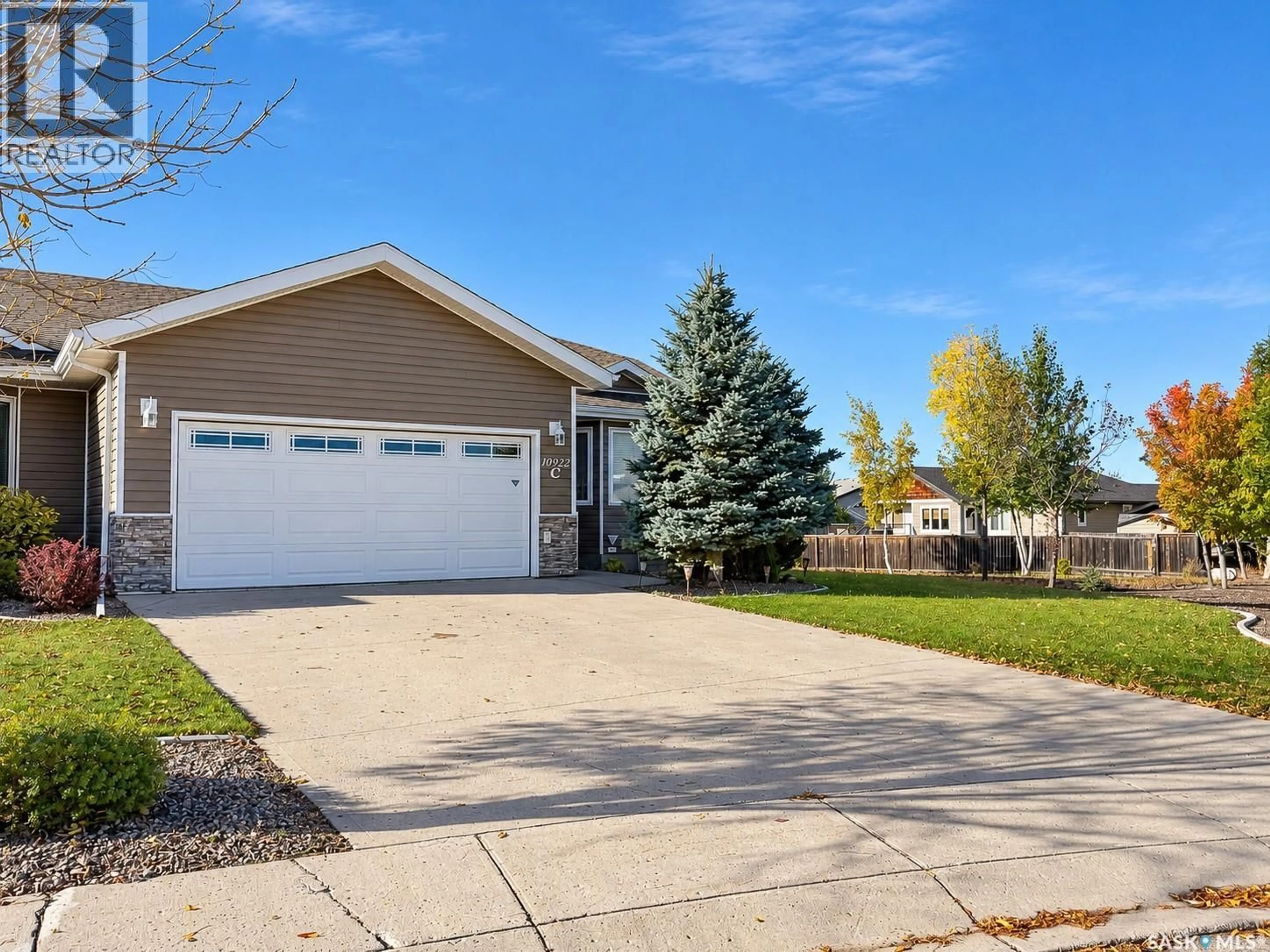 Home with vinyl exterior material, street for C - 10922 AMOS DRIVE, North Battleford Saskatchewan S9A1B6