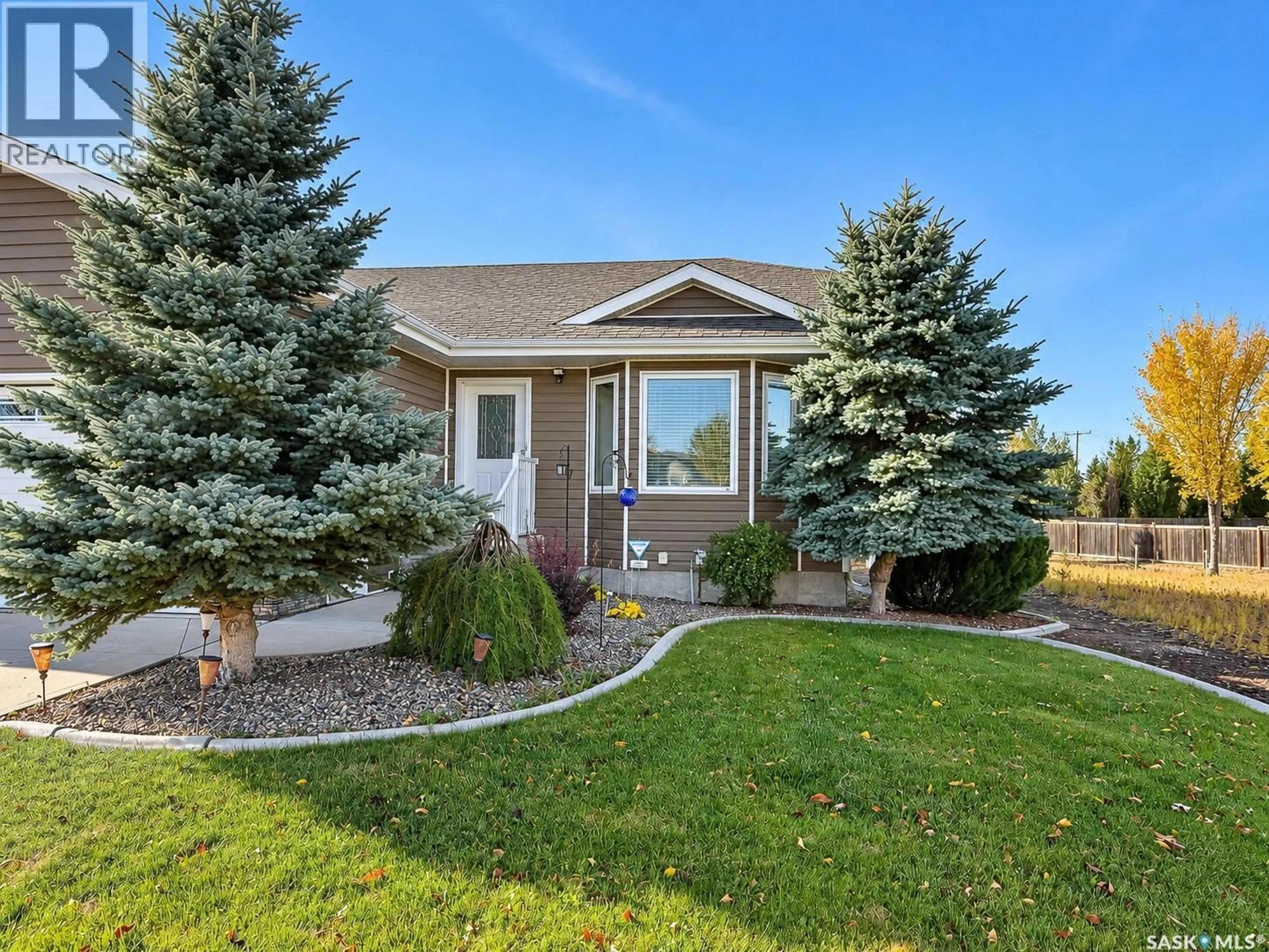 Home with vinyl exterior material, street for C - 10922 AMOS DRIVE, North Battleford Saskatchewan S9A1B6