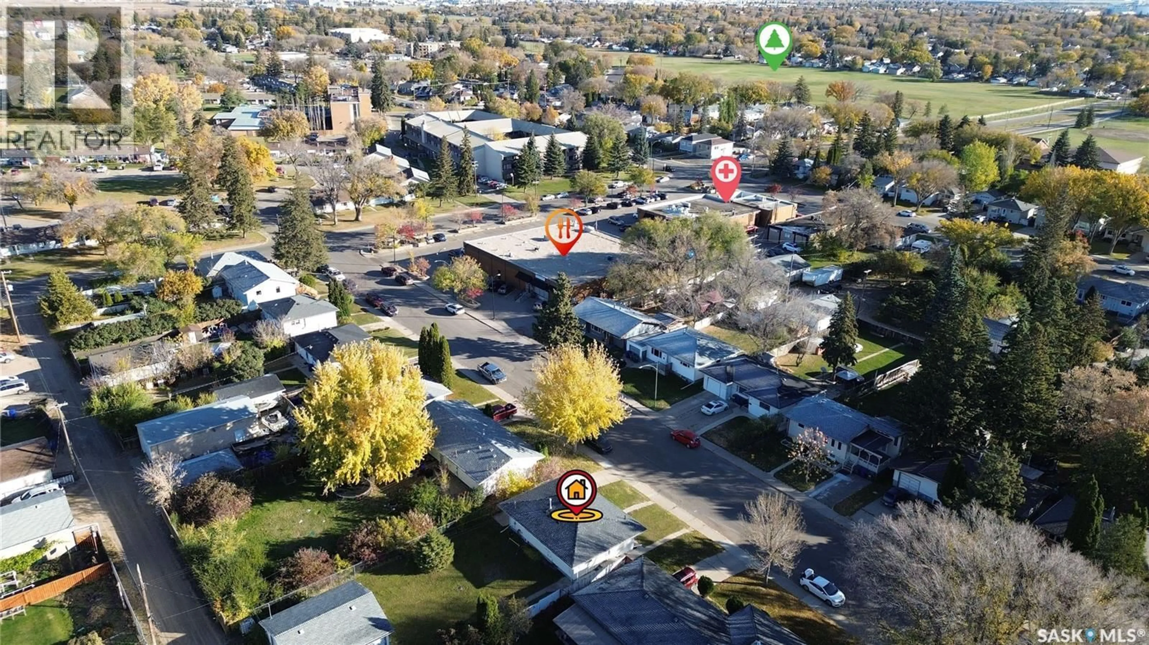 A pic from outside/outdoor area/front of a property/back of a property/a pic from drone, street for 607 Q AVENUE, Saskatoon Saskatchewan S7L2Y2