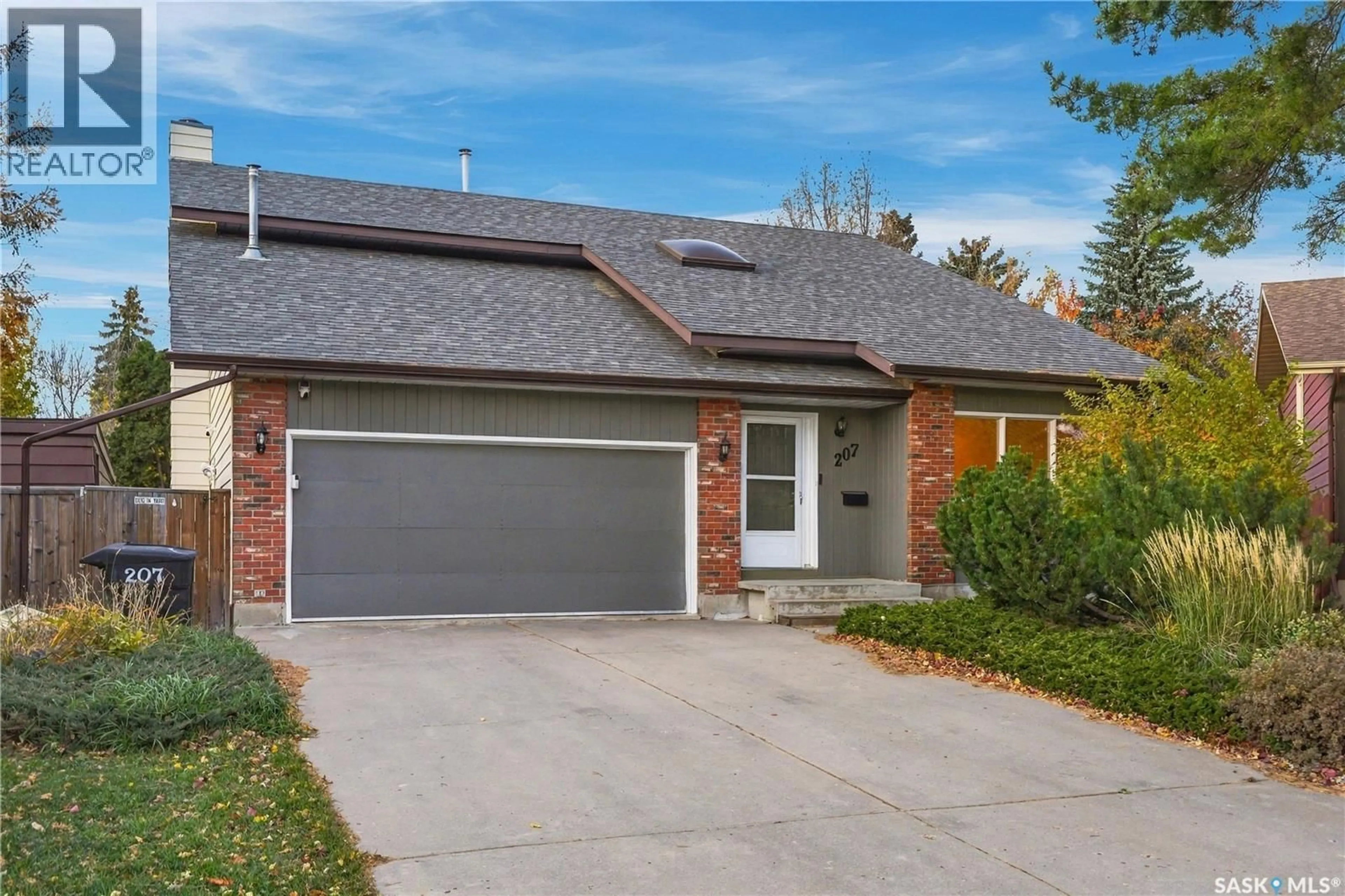 Home with brick exterior material, street for 207 COLDSPRING RISE, Saskatoon Saskatchewan S7J4L5