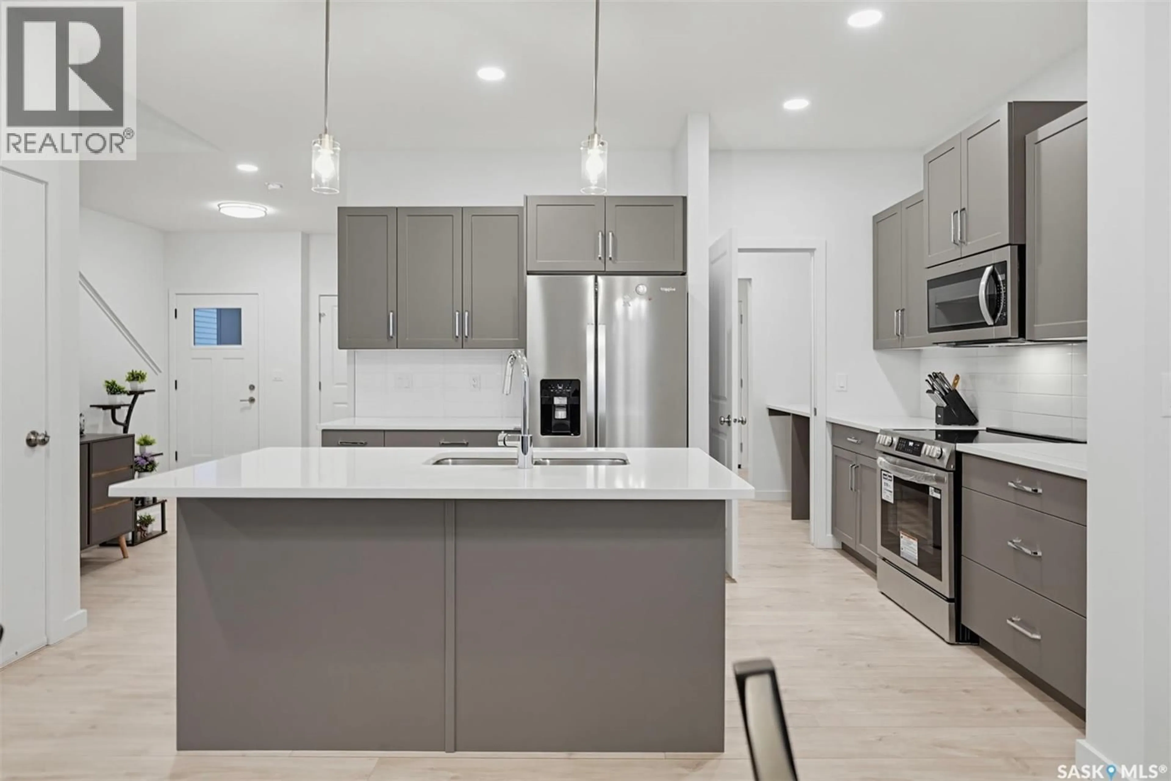 Open concept kitchen, ceramic/tile floor for 246 KATZ COURT, Saskatoon Saskatchewan S7V1S8