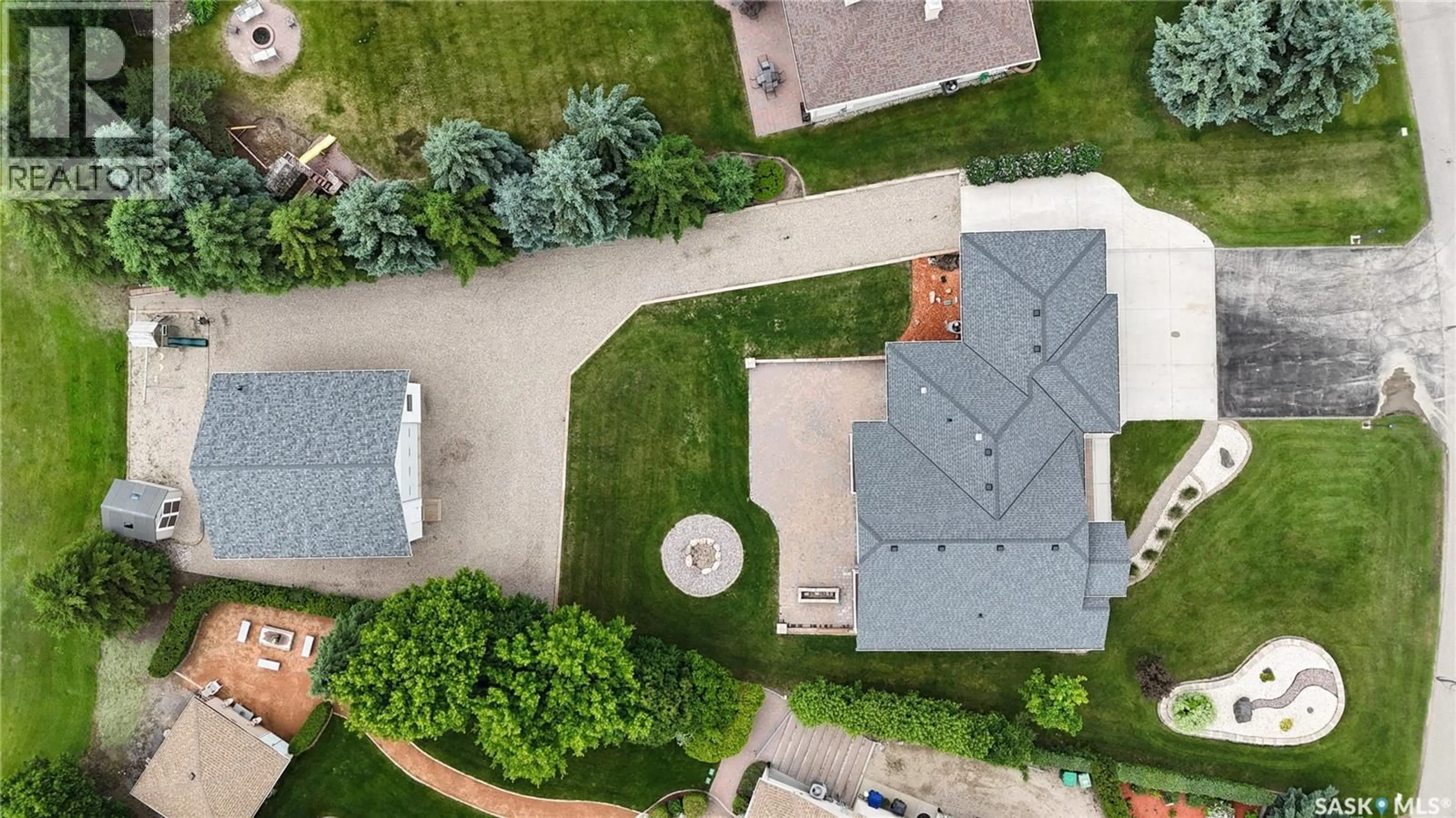 A pic from outside/outdoor area/front of a property/back of a property/a pic from drone, street for 14 LOTT ROAD, White City Saskatchewan S4L5B1