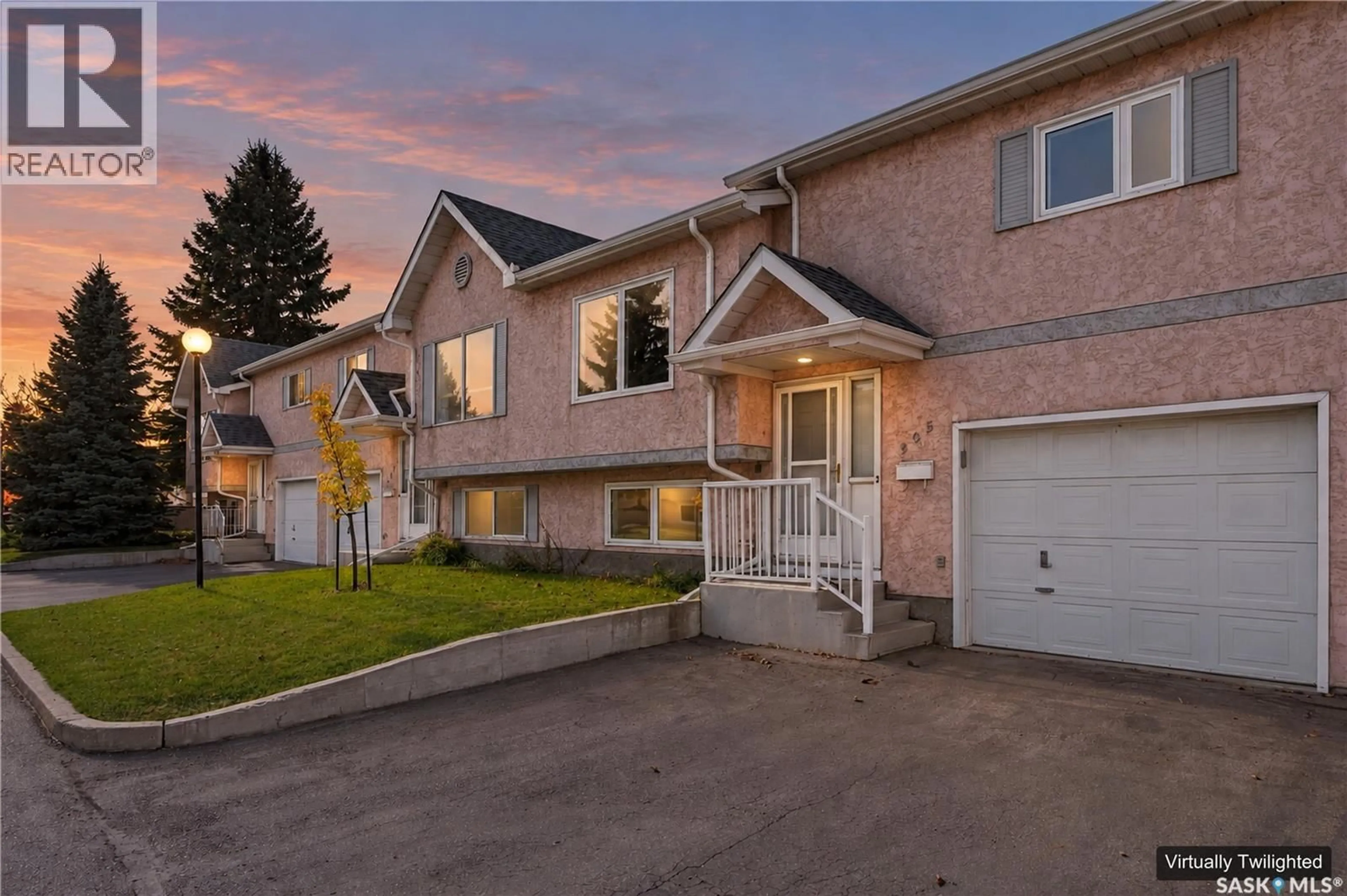 Home with vinyl exterior material, street for 305 - 610 PEREHUDOFF CRESCENT, Saskatoon Saskatchewan S7N4H5