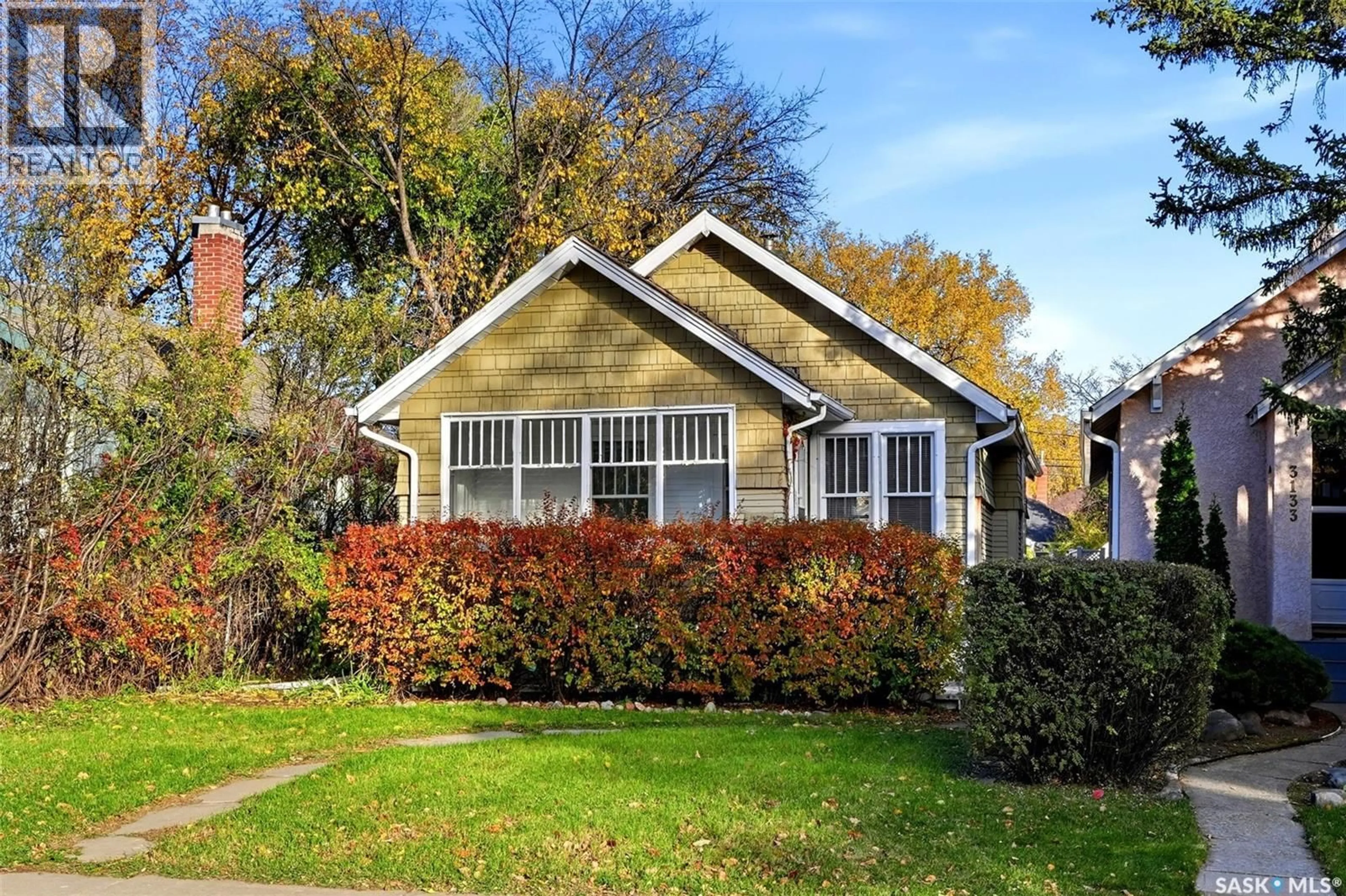 Home with vinyl exterior material, street for 3129 RETALLACK STREET, Regina Saskatchewan S4S1T5