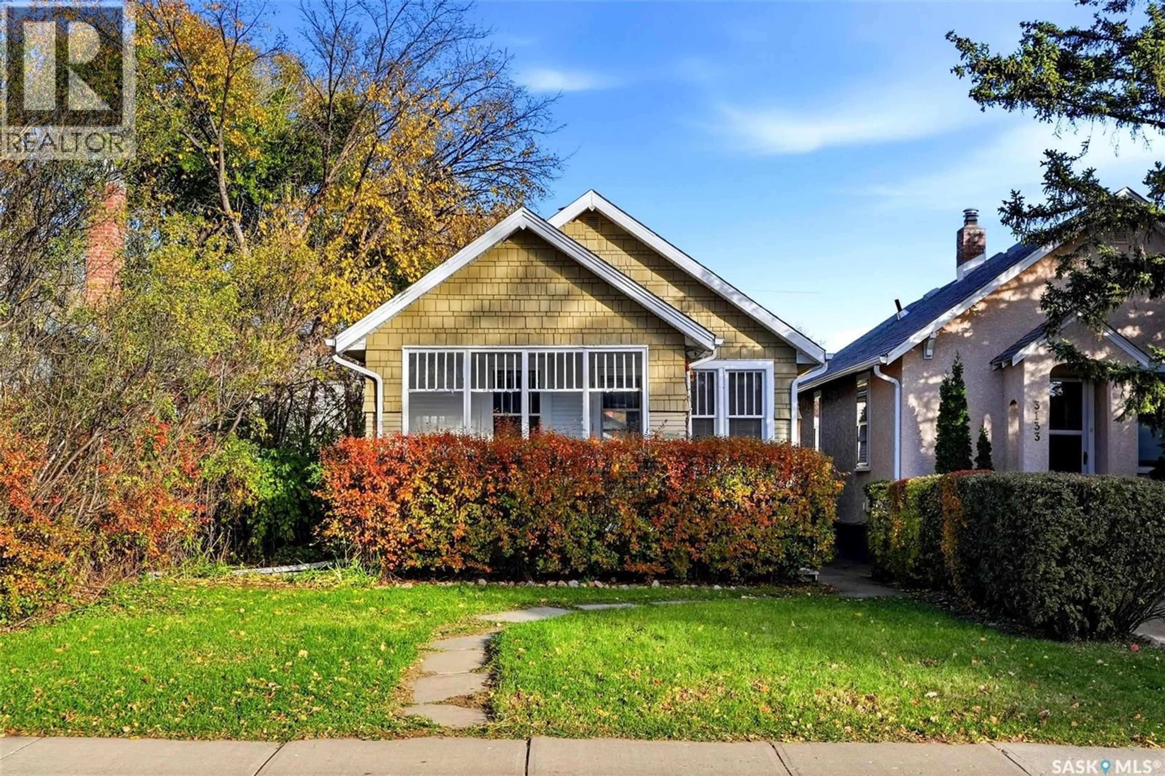 Home with vinyl exterior material, street for 3129 RETALLACK STREET, Regina Saskatchewan S4S1T5