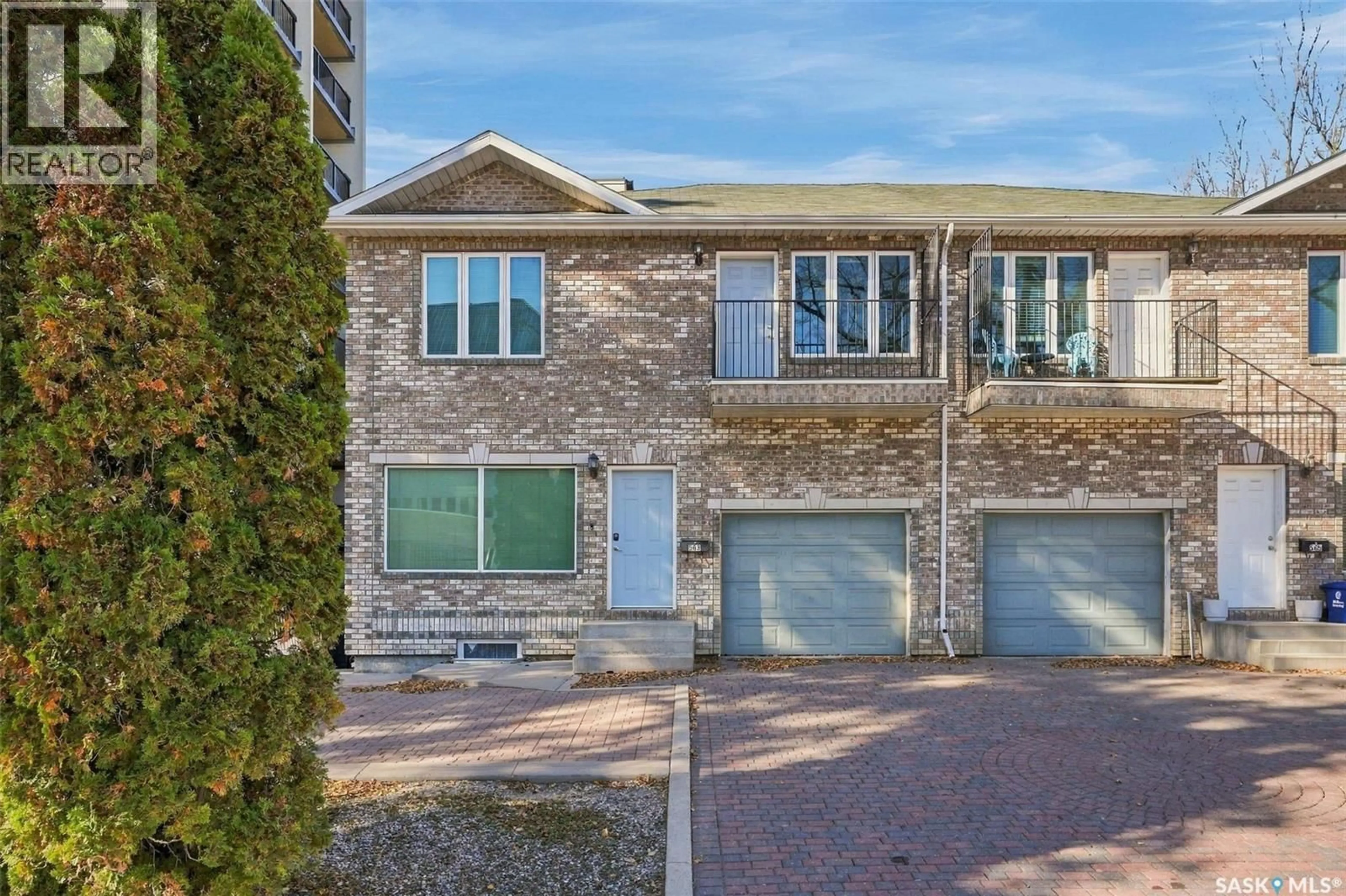 Home with brick exterior material, street for 2 - 563 5TH AVENUE, Saskatoon Saskatchewan S7K2R1