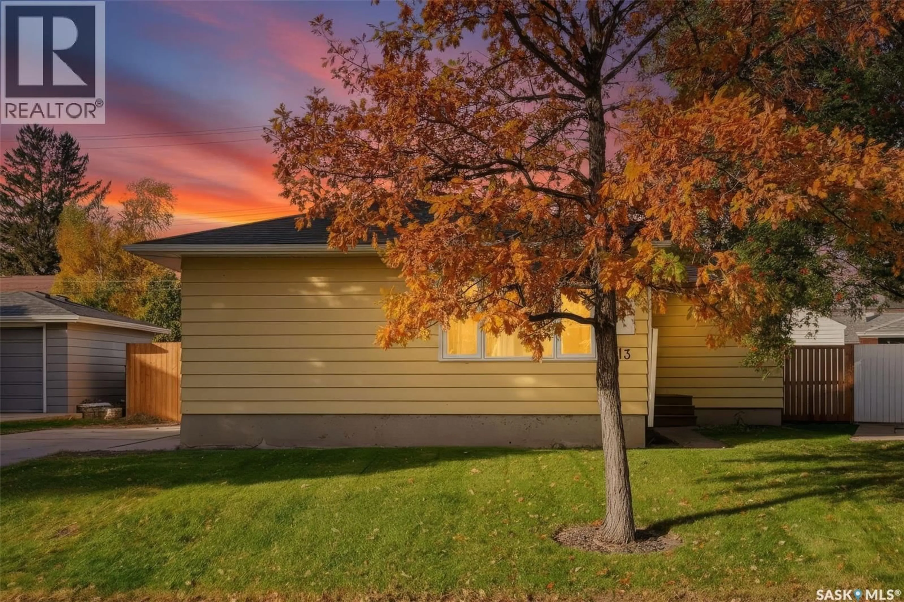 Home with vinyl exterior material, street for 13 STEWART AVENUE, Saskatoon Saskatchewan S7L3S5