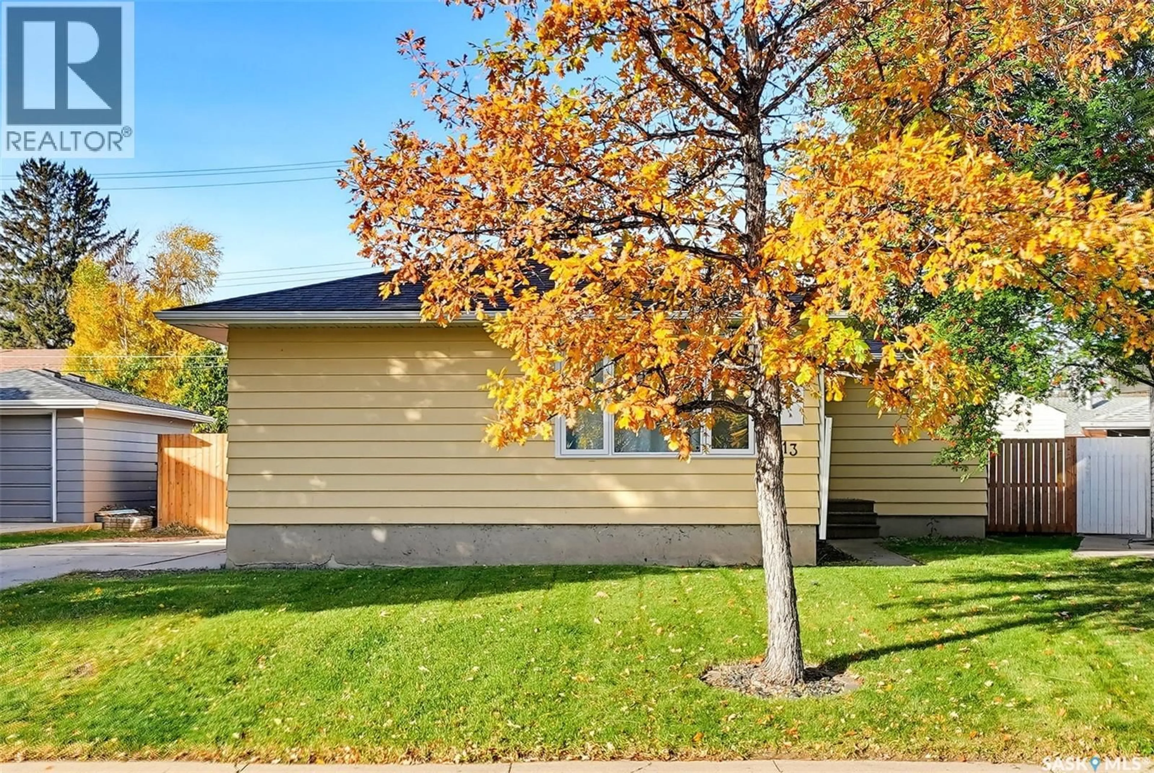 Home with vinyl exterior material, street for 13 STEWART AVENUE, Saskatoon Saskatchewan S7L3S5