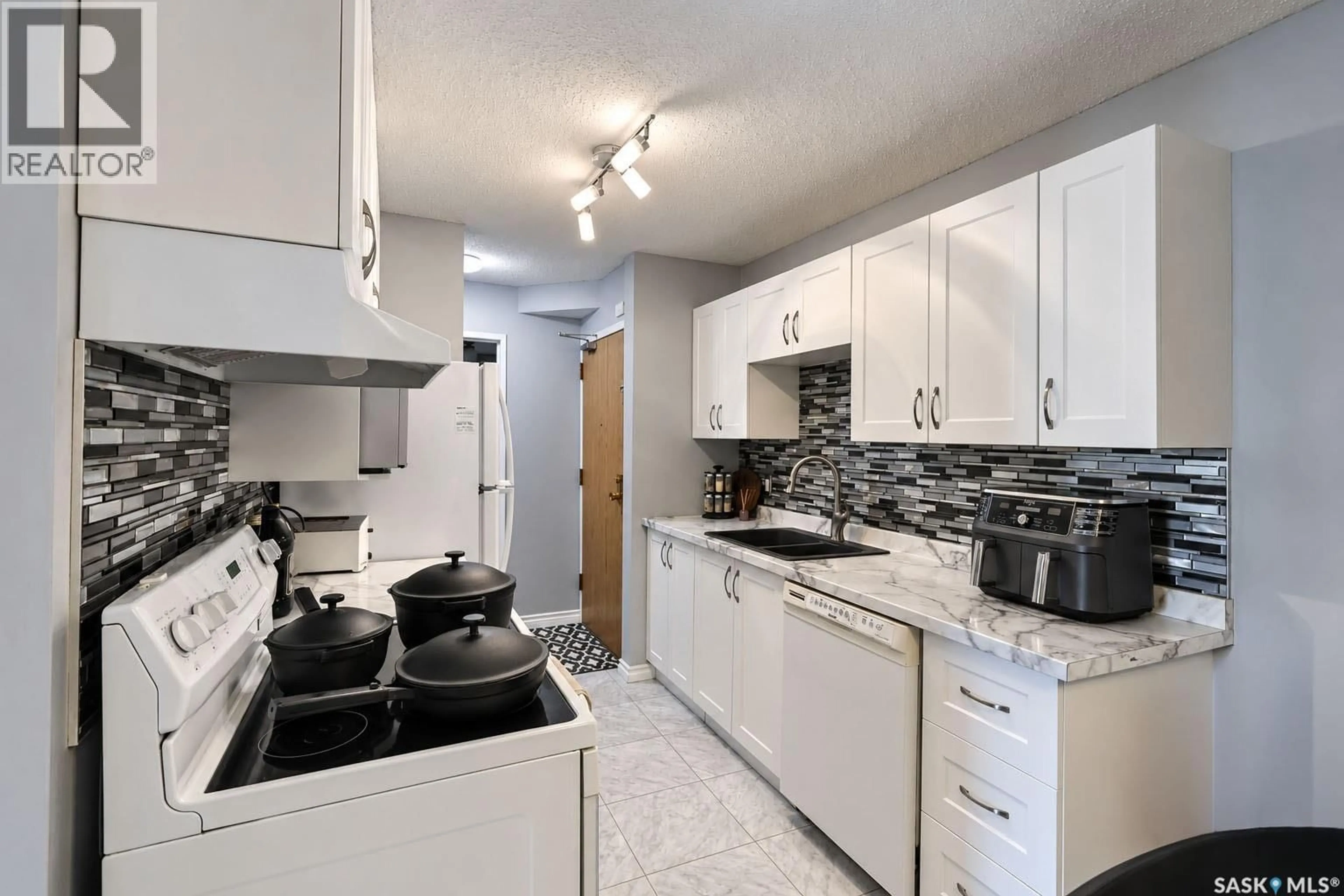 Standard kitchen, unknown for 105 - 1580 OLIVE DIEFENBAKER DRIVE, Prince Albert Saskatchewan S6V7M6