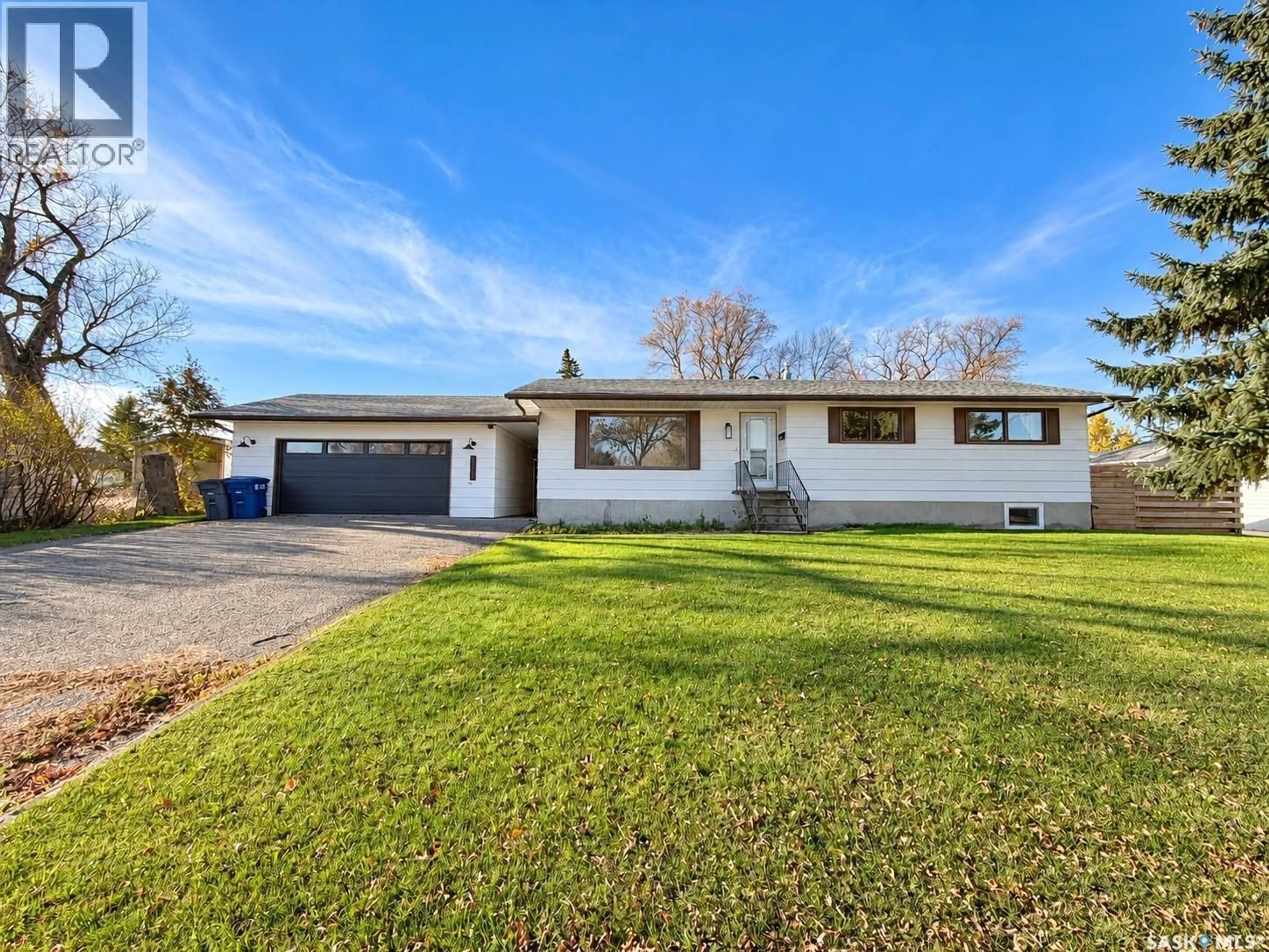 A pic from outside/outdoor area/front of a property/back of a property/a pic from drone, street for 1513 CHESTNUT DRIVE, Moosomin Saskatchewan S0G3N0